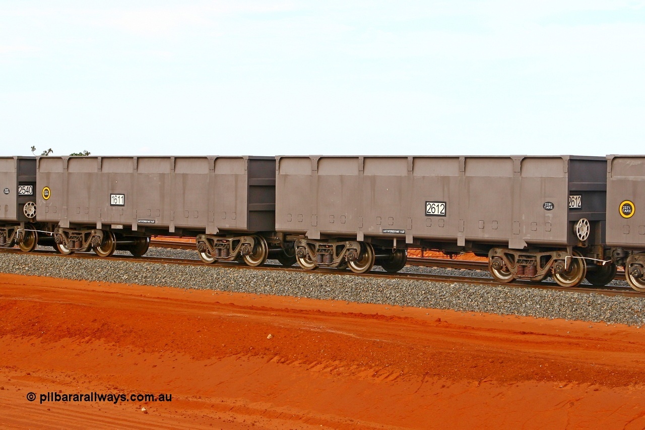 080304 2196r
Thomas Yard, down the rail welding end, new FMG ore waggon pair 1611 slave and 2612 control, built by China Southern or CSR at their Zhuzhou Rolling Stock Works in China in 2007. 4th March 2008.
Keywords: 1611-2612;CSR-Zhuzhou-Rolling-Stock-Works-China;FMG-ore-waggon;