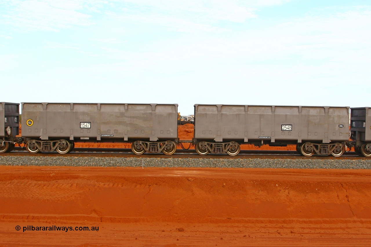 080304 2200
Thomas Yard, down the rail welding end, new FMG ore waggon pair 1547 slave and 2548 control, built by China Southern or CSR at their Zhuzhou Rolling Stock Works in China in 2007. 4th March 2008.
Keywords: 1547-2548;CSR-Zhuzhou-Rolling-Stock-Works-China;FMG-ore-waggon;