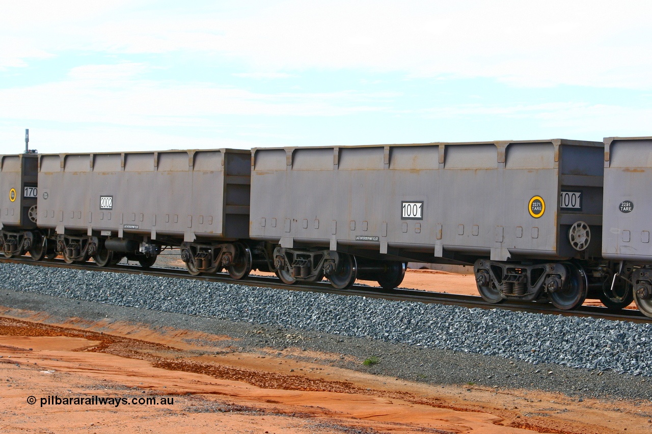 080620 2648
Boodarie, FMG's lowest numbered waggon pair, 1001 [slave] - 2002 [master], on a loaded arriving at the port around the 5 km curve. This was the second set numbered 1001 - 2002, as the original all flat sided pair went on to become a compressor set. Built by CSR Zhuzhou, China in 2007. June 20, 2008.
Keywords: 1001-2002;CSR-Zhuzhou-Rolling-Stock-Works-China;CRRC-Yangtze;FMG-ore-waggon