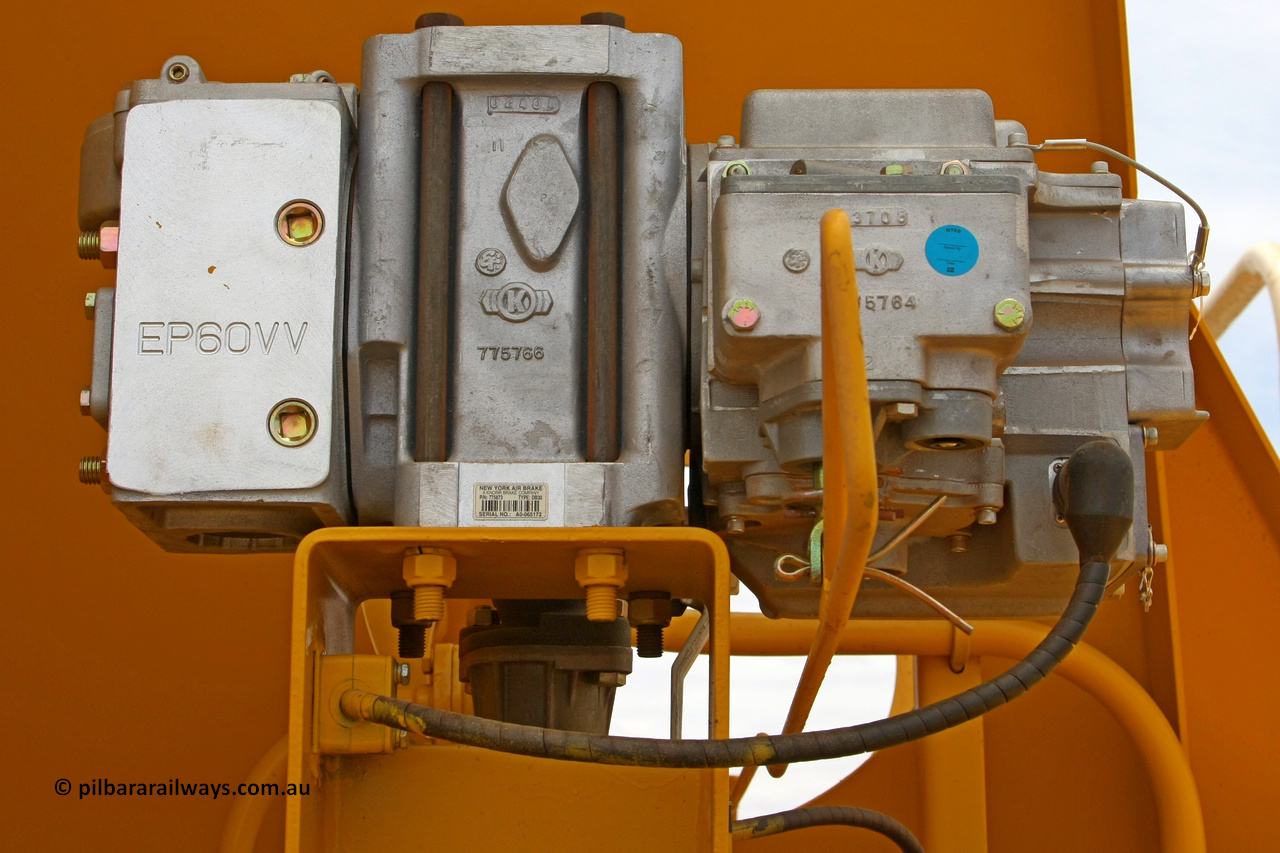 081225 0569
Barker Siding, one of FMG's thirty five ballast waggons, BH 11, EP60VV brake valve view, 100 tonne capacity, built in China by CSR at the Yangtze Rolling Stock Company in 2008. December 25, 2008.
Keywords: BH11;CSR-Yangtze-Rolling-Stock-Co-China;FMG-ballast-waggon;