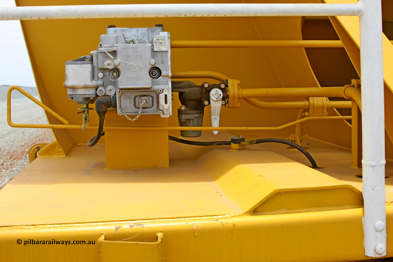 081225 0570
Barker Siding, one of FMG's thirty five ballast waggons, BH 11, EP-60 brake valve and manual release view, 100 tonne capacity, built in China by CSR at the Yangtze Rolling Stock Company in 2008. December 25, 2008.
Keywords: BH11;CSR-Yangtze-Rolling-Stock-Co-China;FMG-ballast-waggon;
