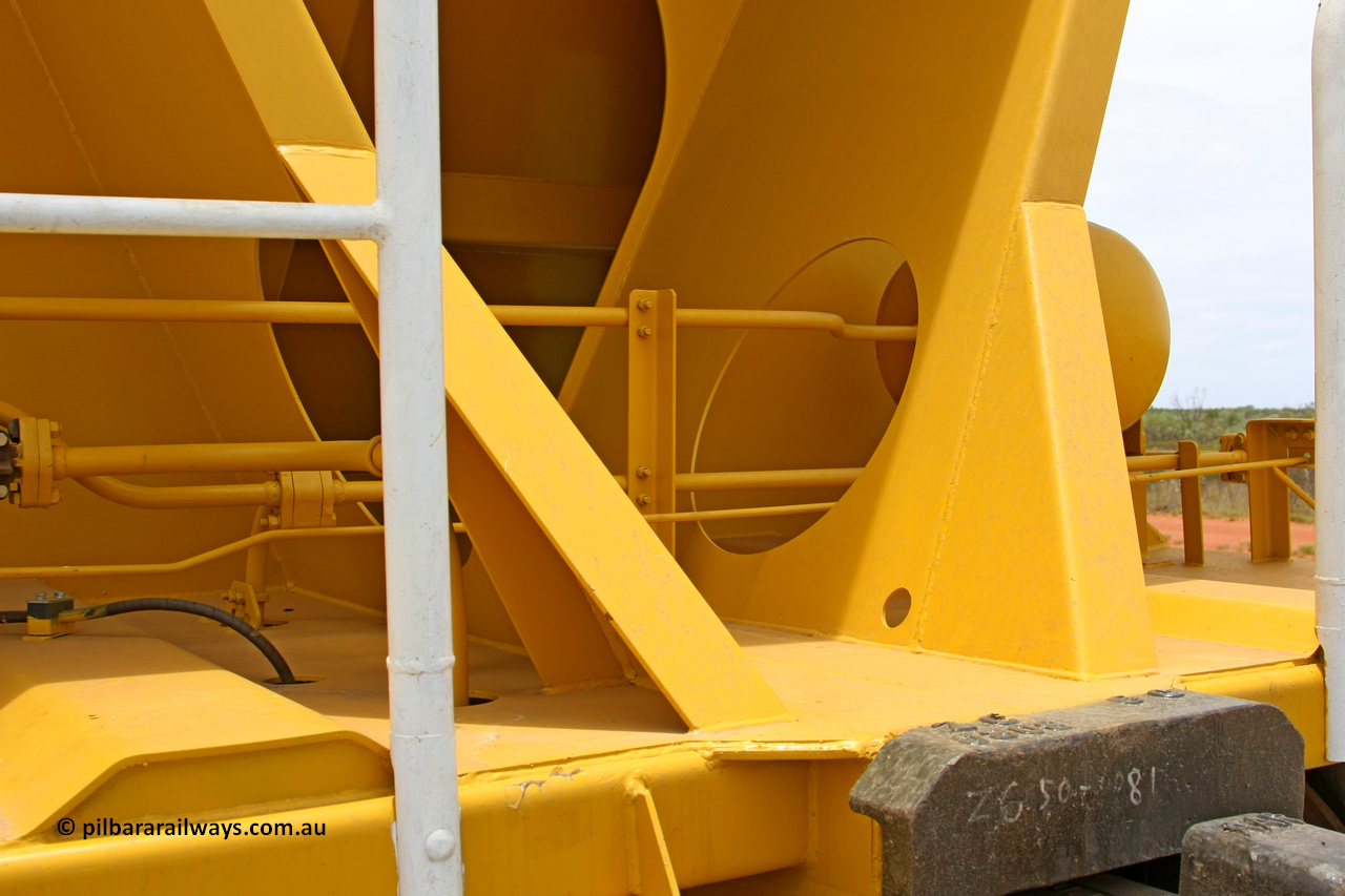 081225 0571
Barker Siding, one of FMG's thirty five ballast waggons, BH 11, non-handbrake end piping view, 100 tonne capacity, built in China by CSR at the Yangtze Rolling Stock Company in 2008. December 25, 2008.
Keywords: BH11;CSR-Yangtze-Rolling-Stock-Co-China;FMG-ballast-waggon;