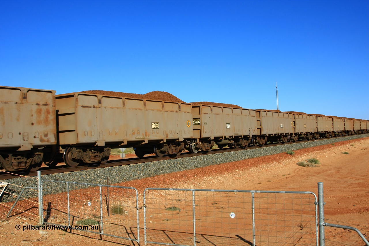 110620 2261
Chapman, a loaded train of Chinese built ore waggons by CSR Zhuzhou Rolling Stock Works loaded with lump ore. 20th June 2011.
Keywords: CSR-Zhuzhou-Rolling-Stock-Works-China;FMG-ore-waggon;