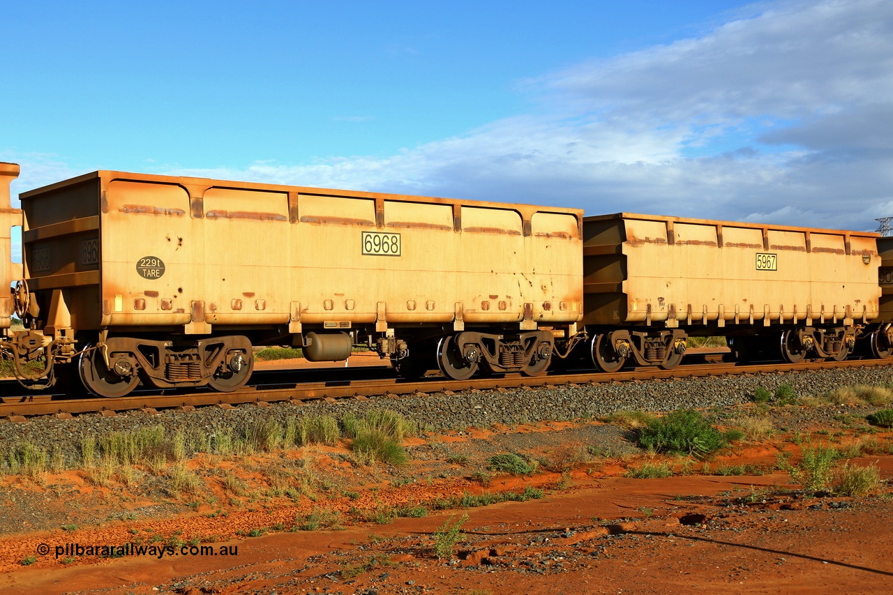 200412 5921
Boodarie, part of a loaded FMG train, a mismatched waggon pair, both are CSR Yangtze Rolling Stock Co. of China builds, 6968 would be a 2013 built, but the 5967 should be a 2014 build and numbered in the 72xx-74xx series. 12th April 2020.
Keywords: 5967-6968;CSR-Yangtze-Rolling-Stock-Co-China;FMG-ore-waggon