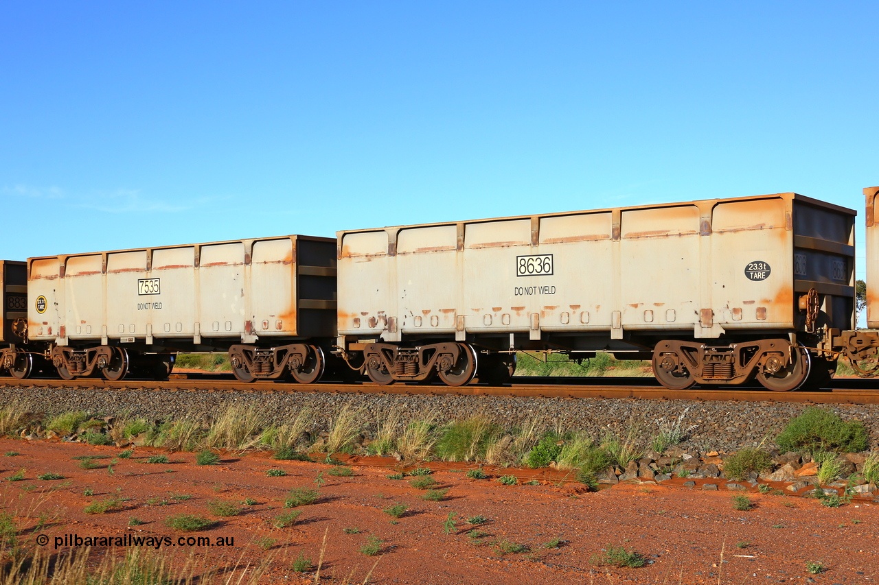 200412 6069
Boodarie, part of a loaded FMG train, a mismatched waggon pair, both are CRRC Yangtze Rolling Stock Co. of China builds, 7535 is a slave waggon with rotary coupler and 23.1 tonne tare and carrying the wrong number as it should be 7635, coupled to control waggon 8636 23.3 tonnes tare. Earlier on the same day I saw another 7535 coupled to a 8536. Both should be 2018 builds. 12th April 2020.
Keywords: 7535-8636;CRRC-Yangtze-Rolling-Stock-Co-China;FMG-ore-waggon