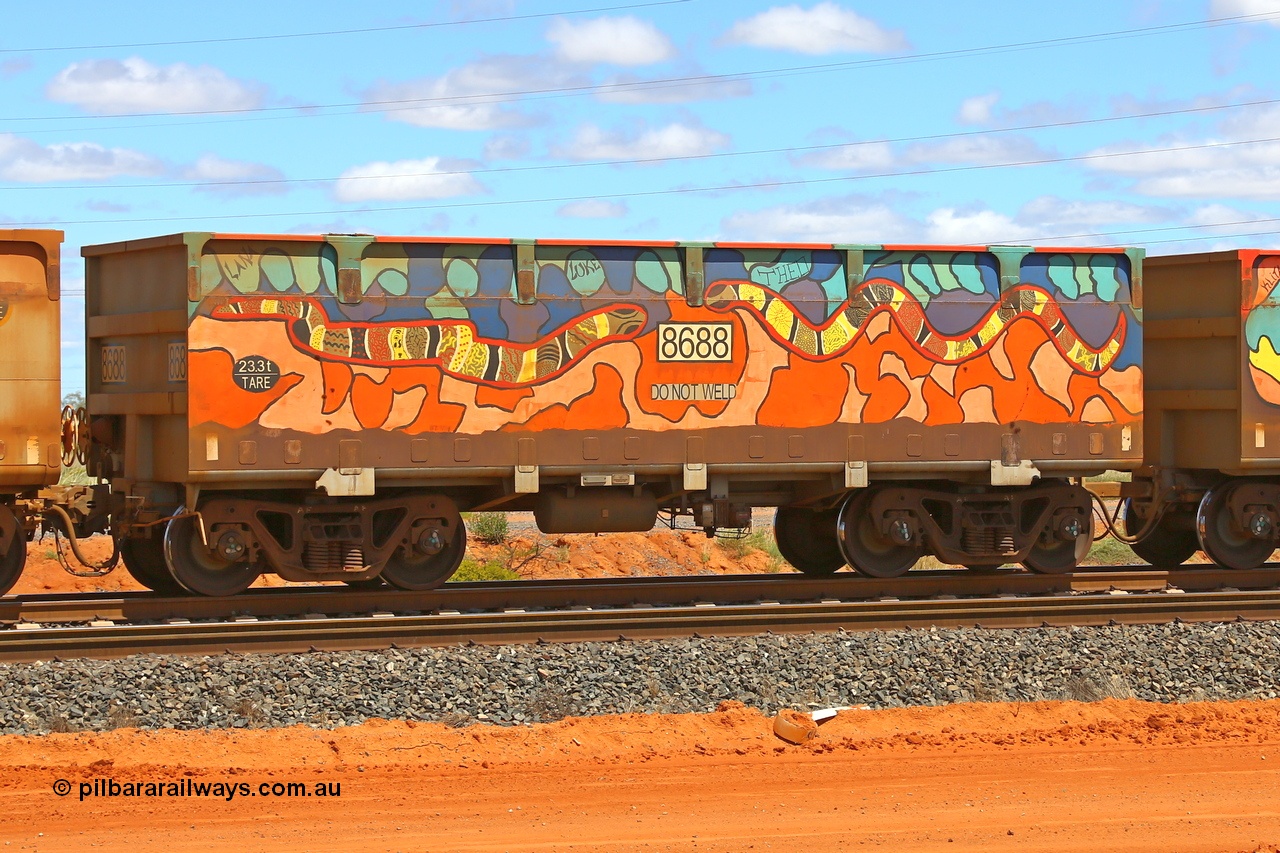 210321 9037
Boodarie, part of a loaded FMG train, painted ore waggon pair 7687 - 8688 built by CRRC Yangtze Rolling Stock Co. of China in 2018, 8688 waggon view, it features mural painting by students of South Hedland High School and was painted in August 2018. March 21, 2021.
Keywords: 7687-8688;CRRC-Yangtze-China;FMG-ore-waggon