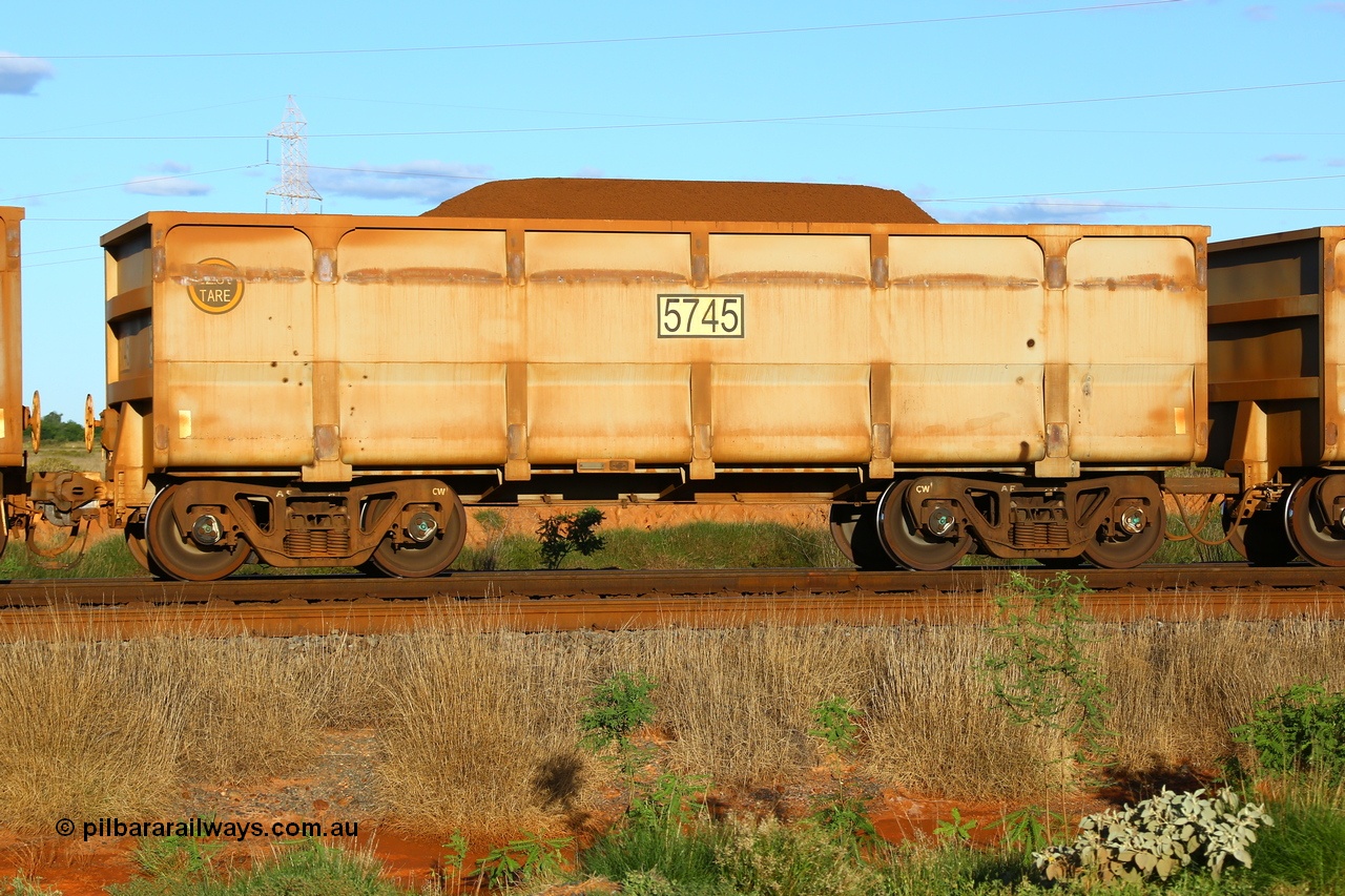 210321 9303
Boodarie on the 5 km curve loaded FMG slave ore waggon 5745 was built by CSR Yangtze with a prototype pressed lower panels and is joined to 6746. This pair is the same as 3005 - 4006. 21st March 2021.
Keywords: CSR-Yangtze-Rolling-Stock-Co-China