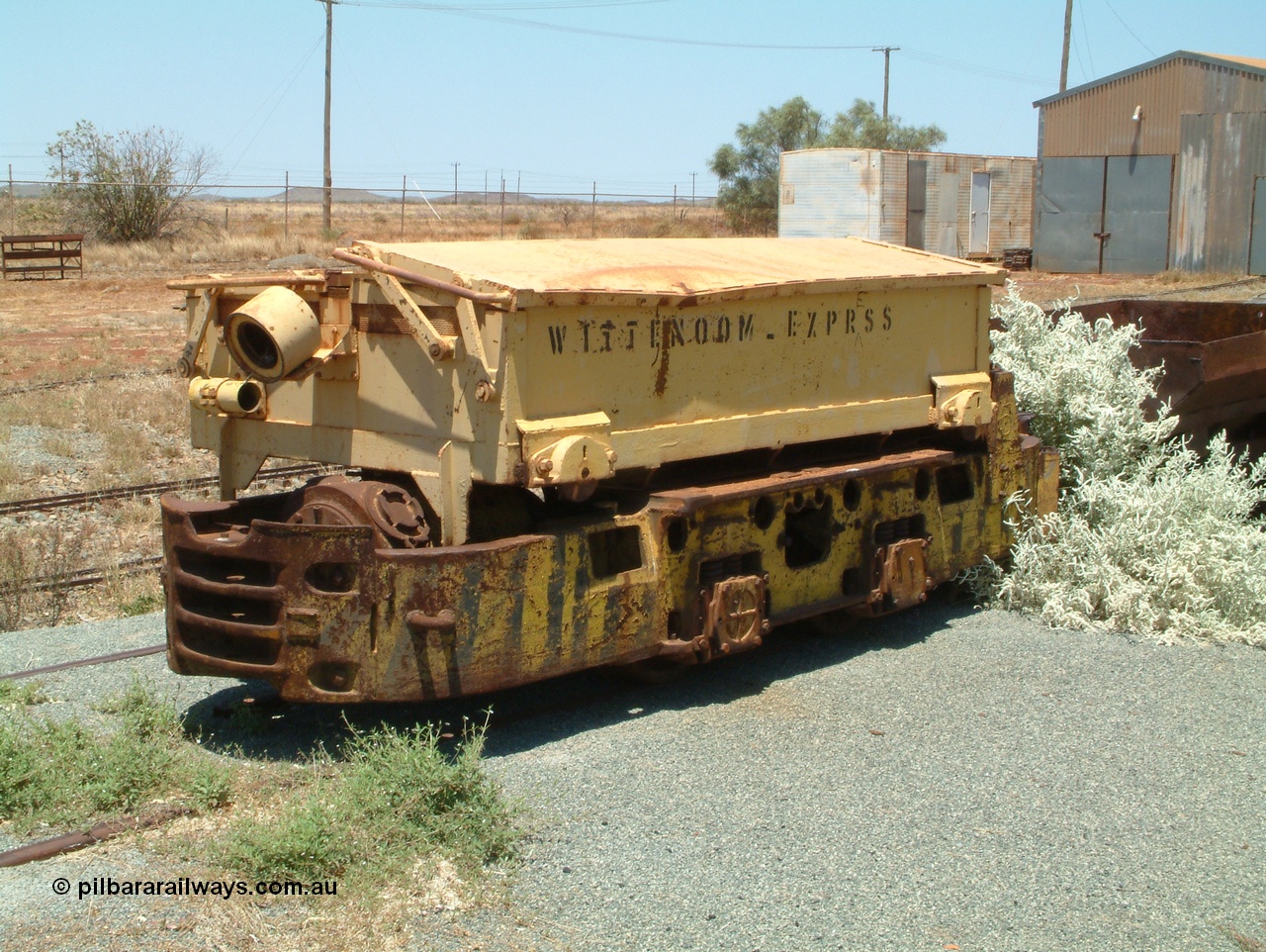 041014 122804
Pilbara Railways Historical Society, Mancha battery hauler from the former CSR underground blue asbestos mine at Wittenoom, driving position is at the rear in this shot. Shows misspelling on the side of EXPRSS rather than express. Donated to the Society in 2003. 14th October 2004.
Keywords: Mancha;