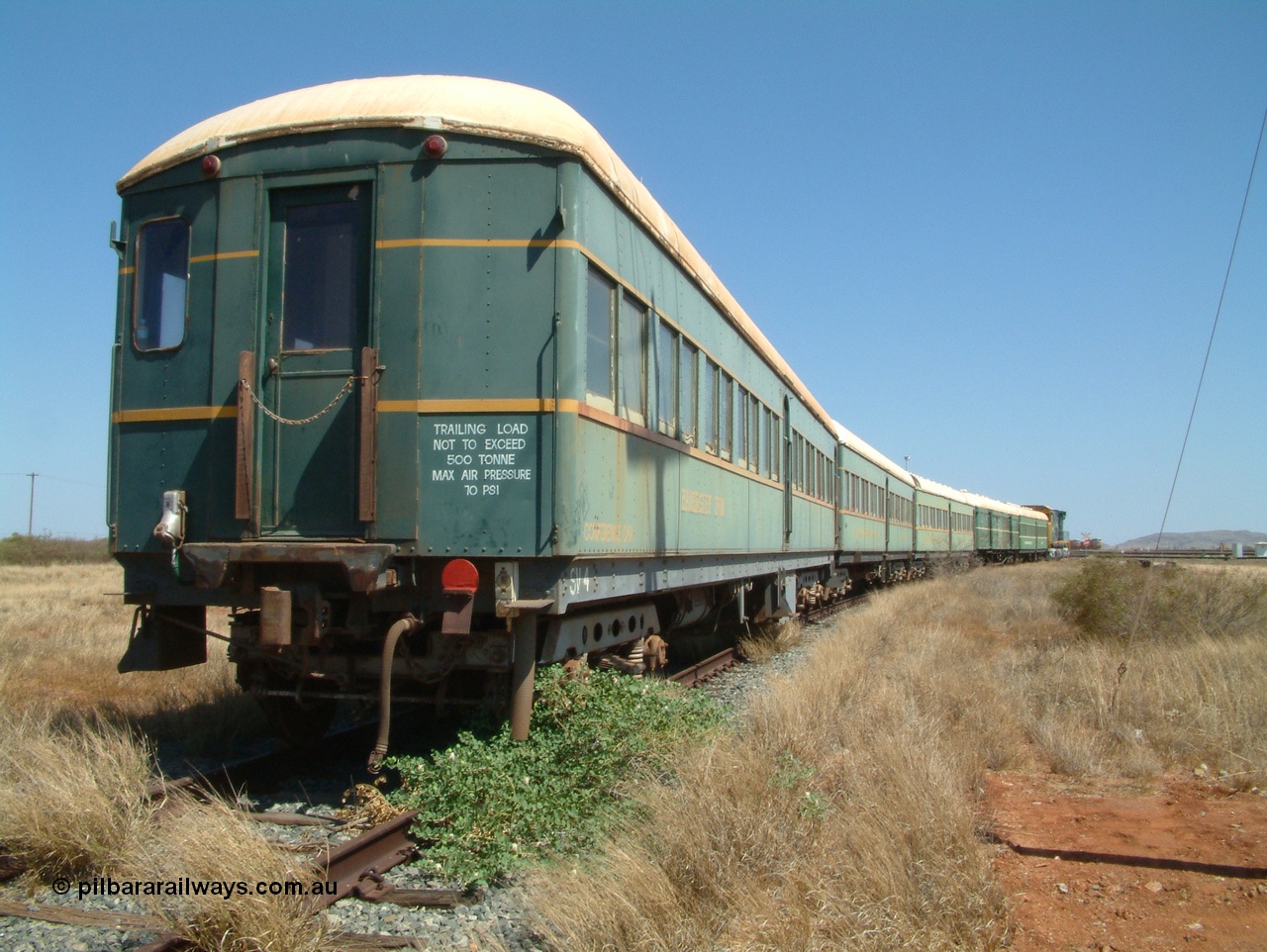 041014 141930
Pilbara Railways Historical Society, view along the passenger carriages, closest is the 'Conference Car' with SV 4 still visible, originally built by Clyde Engineering at Granville NSW in 1935 for the NSWGR as a second class railway carriage FS type FS 2010. In 1975 it was purchased by Hamersley Iron and converted to an inspection vehicle SV 4. When donated to the Society it was repurposed as a conference car. 14th October 2004.
Keywords: FS2010;FS-type;Clyde-Engineering-Granville-NSW;