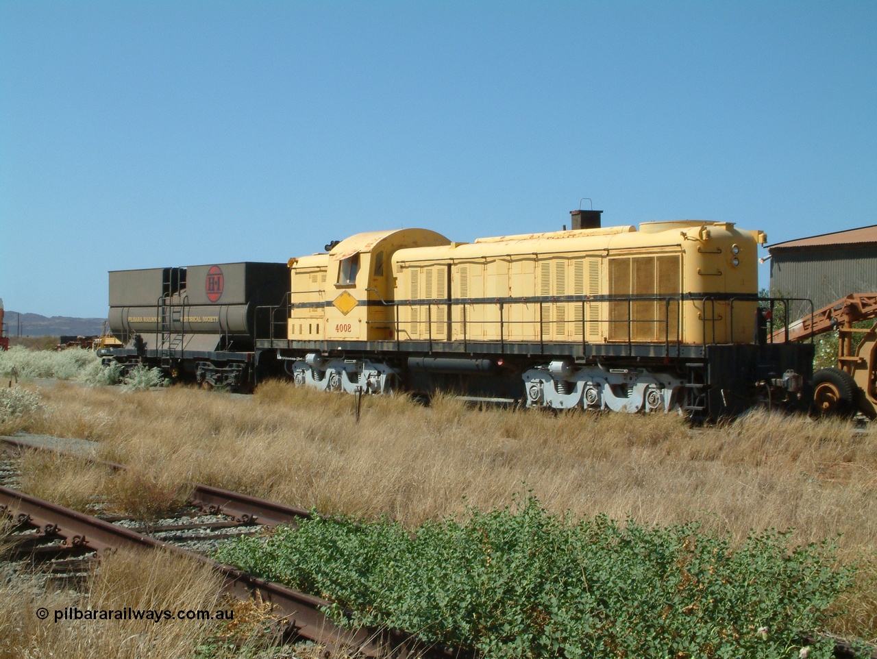 041014 142502
Pilbara Railways Historical Society museum, former Cliffs Robe River Iron Associates RSC-3 model ALCo locomotive built by Montreal Locomotive Works (MLW) in 1951 for NSWGR as the 40 class 4002 serial 77733, purchased by CRRIA in 1971 and numbered 261.002, then 1705 and finally 9405. 4002 is preserved in an operational state and another claim to fame is it run the Royal Train in NSW February 1954. Donated to the Society in 1979. 14th October 2004.
Keywords: 4002;MLW;ALCo;RSC3;77733;9405;40-class;