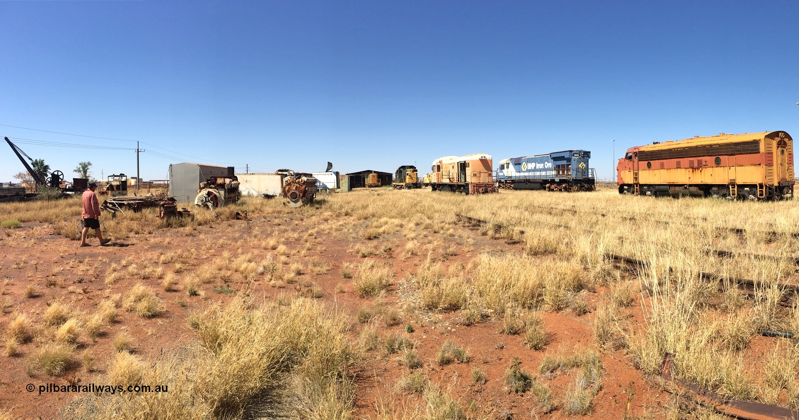 200914 iPhone IMG 8830
Pilbara Railways Historical Society, in this panorama image you can see from the left, the PWD crane, waggons and Simplex loco from Point Samson, a couple of ALCo engines, the Locotrol 'cab'; off of BHP 5663, the ALCo S2 Hamersley Iron 007 'Mabel', ALCo C415 demonstrator Hamersley Iron 1000, former NSWGR ALCo RSC-3 Robe River Iron Associates 9405 renumbered to 4002, English Electric ST95B Goldsworthy Mining 1, ALCo M636 BHP 5502 and EMD F7A Mt Newman Mining 5450. 14th September 2020.
