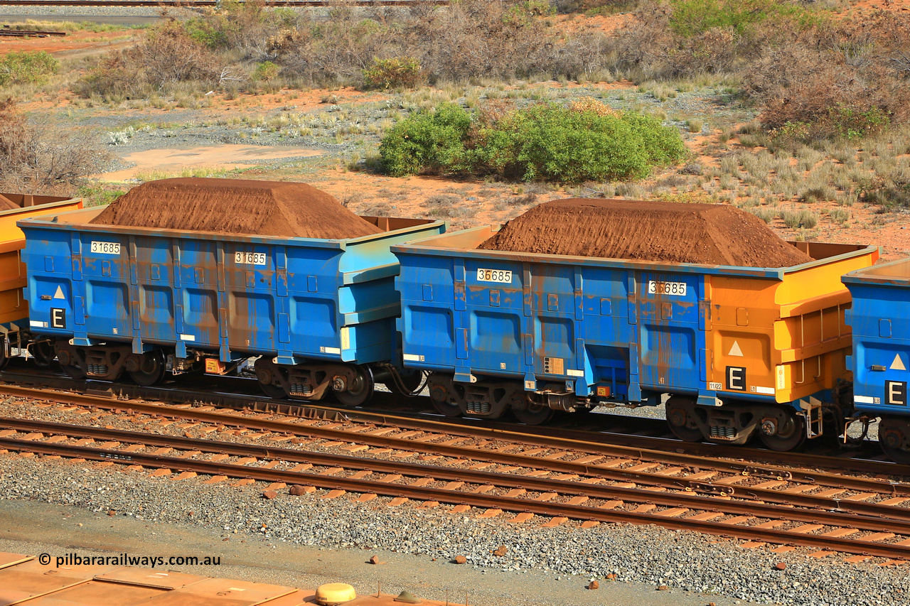 240619 0337
Cape Lambert yard, one of Rio Tinto's blue rakes with spring assisted park brake and only electronic controlled pneumatic [ECP] braking, waggon pair 31685 is a master and is bar coupled to slave waggon 36685 built by China Northen as a Q type in 11/2022. Captured on June 19, 2024.
Keywords: 31685;36685;Q-type;China-Northern;Rio-ore-waggon;