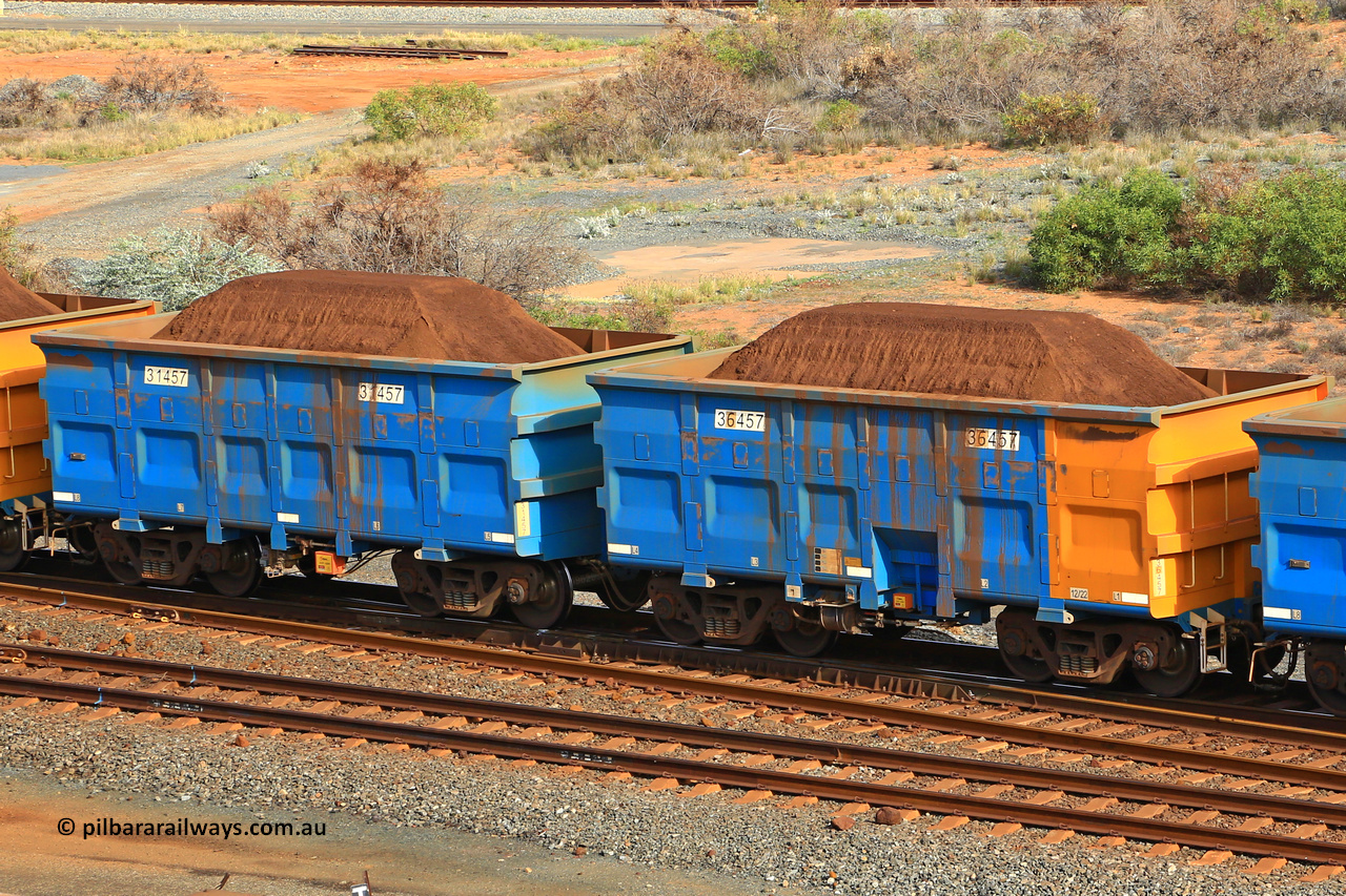240619 0339
Cape Lambert yard, one of Rio Tinto's blue rakes with spring assisted park brake and only electronic controlled pneumatic [ECP] braking, waggon pair 31457 is a master and is bar coupled to slave waggon 36457 built by China Northen as a Q type in 12/2022. Captured on June 19, 2024.
Keywords: 31457;36457;Q-type;China-Northern;Rio-ore-waggon;