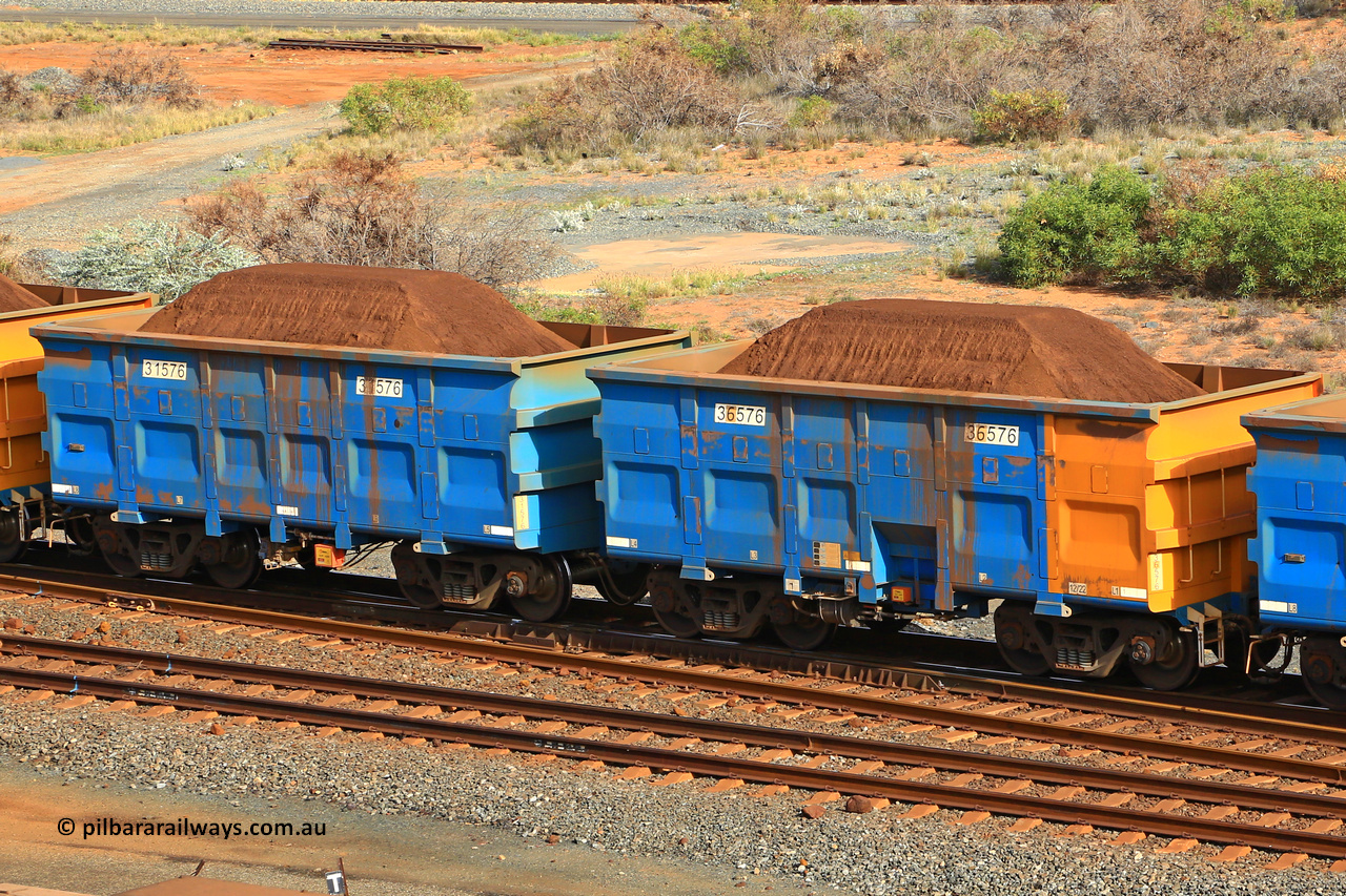 240619 0341
Cape Lambert yard, one of Rio Tinto's blue rakes with spring assisted park brake and only electronic controlled pneumatic [ECP] braking, waggon pair 31576 is a master and is bar coupled to slave waggon 36576 built by China Northen as a Q type in 12/2022. Captured on June 19, 2024.
Keywords: 31576;36576;Q-type;China-Northern;Rio-ore-waggon;