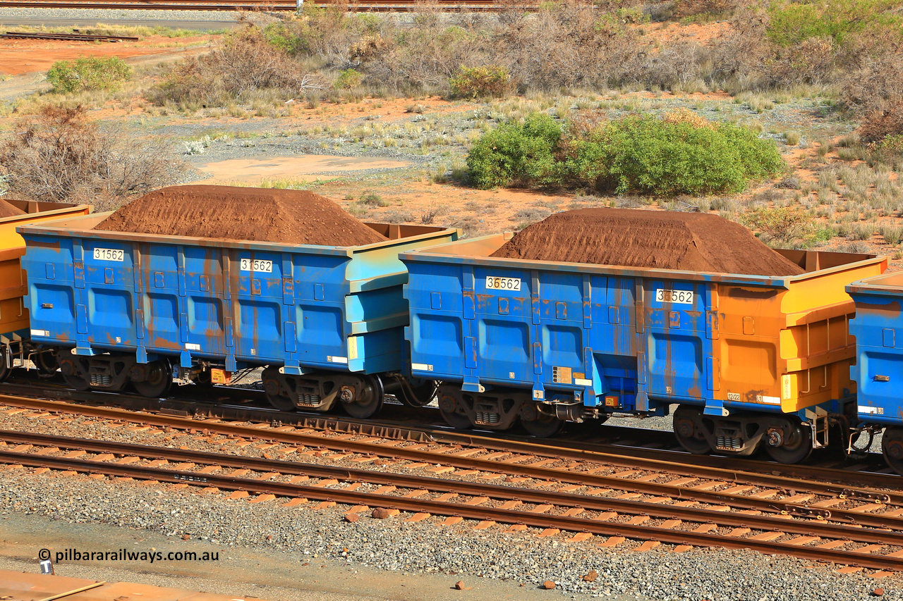 240619 0342
Cape Lambert yard, one of Rio Tinto's blue rakes with spring assisted park brake and only electronic controlled pneumatic [ECP] braking, waggon pair 31562 is a master and is bar coupled to slave waggon 36562 built by China Northen as a Q type in 12/2022. Captured on June 19, 2024.
Keywords: 31562;36562;Q-type;China-Northern;Rio-ore-waggon;