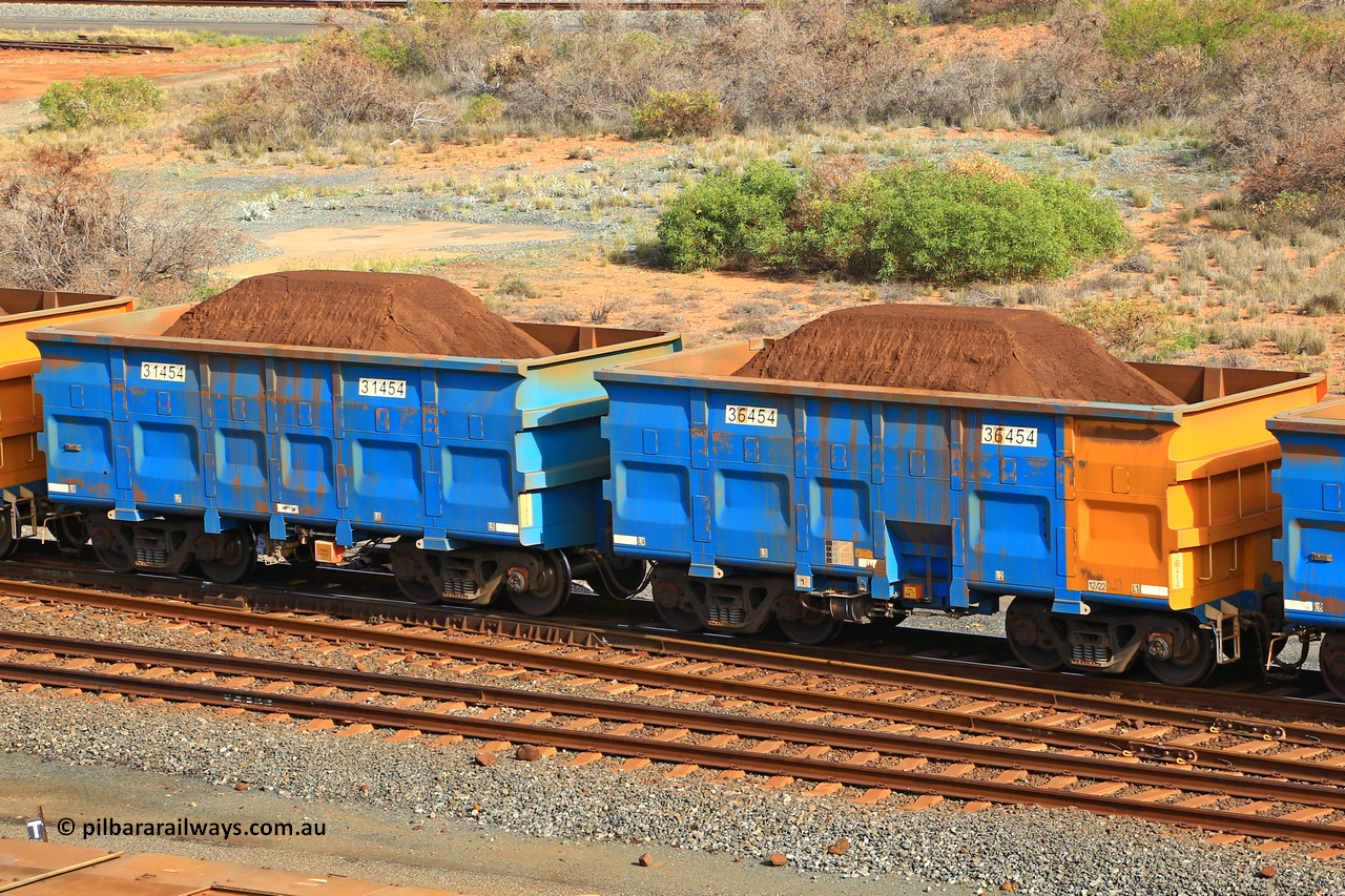 240619 0346
Cape Lambert yard, one of Rio Tinto's blue rakes with spring assisted park brake and only electronic controlled pneumatic [ECP] braking, waggon pair 31454 is a master and is bar coupled to slave waggon 36454 built by China Northen as a Q type in 12/2022. Captured on June 19, 2024.
Keywords: 31454;36454;Q-type;China-Northern;Rio-ore-waggon;