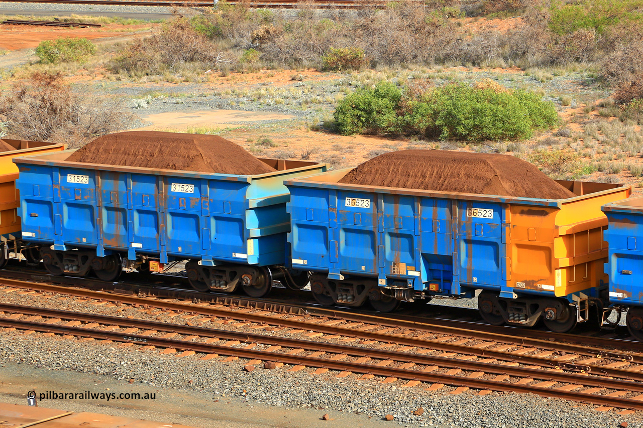 240619 0349
Cape Lambert yard, one of Rio Tinto's blue rakes with spring assisted park brake and only electronic controlled pneumatic [ECP] braking, waggon pair 31523 is a master and is bar coupled to slave waggon 36523 built by China Northen as a Q type in 12/2022. Captured on June 19, 2024.
Keywords: 31523;36523;Q-type;China-Northern;Rio-ore-waggon;