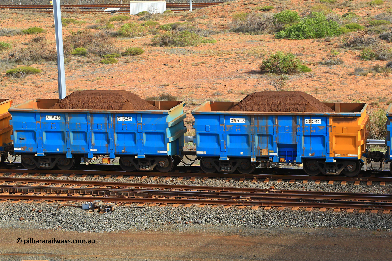240619 0357
Cape Lambert yard, one of Rio Tinto's blue rakes with spring assisted park brake and only electronic controlled pneumatic [ECP] braking, waggon pair 31545 is a master and is bar coupled to slave waggon 36545 built by China Northen as a Q type in 12/2022. Captured on June 19, 2024.
Keywords: 31545;36545;Q-type;China-Northern;Rio-ore-waggon;