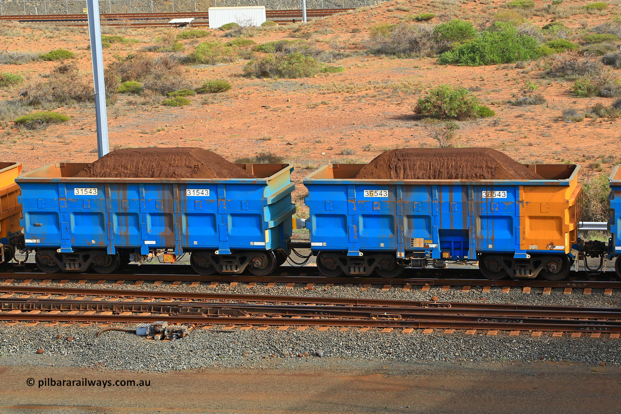 240619 0363
Cape Lambert yard, one of Rio Tinto's blue rakes with spring assisted park brake and only electronic controlled pneumatic [ECP] braking, waggon pair 31543 is a master and is bar coupled to slave waggon 36543 built by China Northen as a Q type in 12/2022. Captured on June 19, 2024.
Keywords: 31543;36543;Q-type;China-Northern;Rio-ore-waggon;