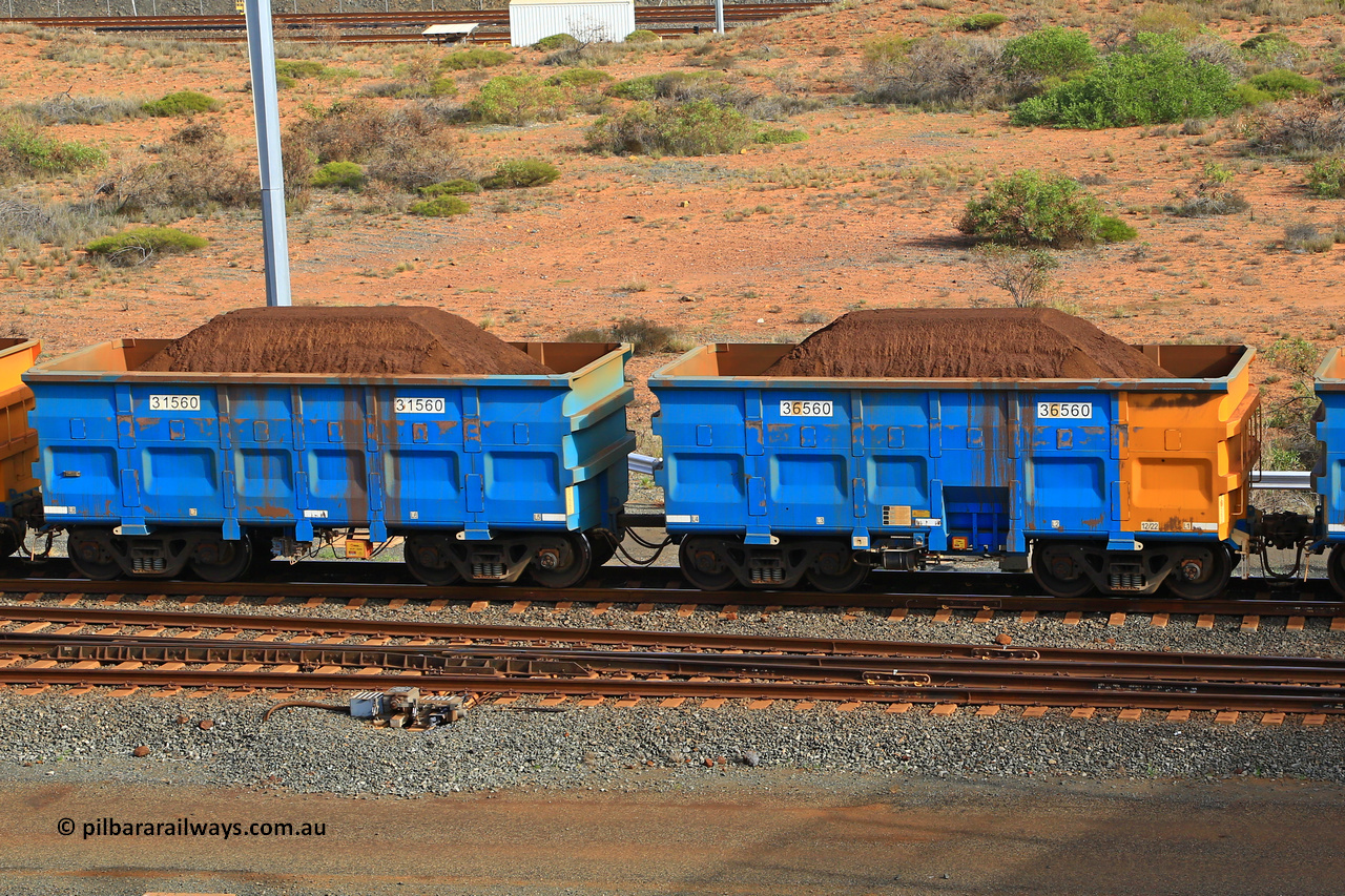 240619 0364
Cape Lambert yard, one of Rio Tinto's blue rakes with spring assisted park brake and only electronic controlled pneumatic [ECP] braking, waggon pair 31560 is a master and is bar coupled to slave waggon 36560 built by China Northen as a Q type in 12/2022. Captured on June 19, 2024.
Keywords: 31560;36560;Q-type;China-Northern;Rio-ore-waggon;