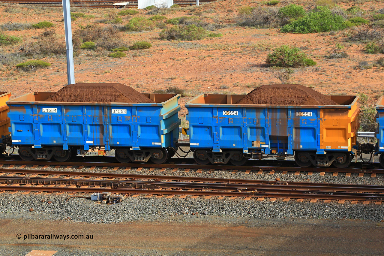 240619 0368
Cape Lambert yard, one of Rio Tinto's blue rakes with spring assisted park brake and only electronic controlled pneumatic [ECP] braking, waggon pair 31554 is a master and is bar coupled to slave waggon 36554 built by China Northen as a Q type in 12/2022. Captured on June 19, 2024.
Keywords: 31554;36554;Q-type;China-Northern;Rio-ore-waggon;