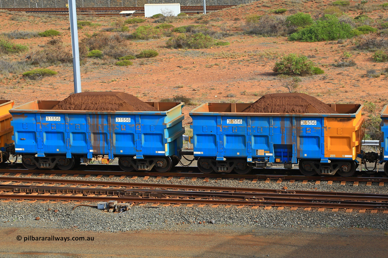 240619 0369
Cape Lambert yard, one of Rio Tinto's blue rakes with spring assisted park brake and only electronic controlled pneumatic [ECP] braking, waggon pair 31556 is a master and is bar coupled to slave waggon 36556 built by China Northen as a Q type in 12/2022. Captured on June 19, 2024.
Keywords: 31556;36556;Q-type;China-Northern;Rio-ore-waggon;