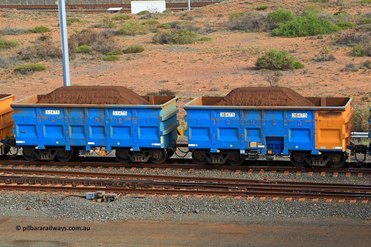 240619 0374
Cape Lambert yard, one of Rio Tinto's blue rakes with spring assisted park brake and only electronic controlled pneumatic [ECP] braking, waggon pair 31475 is a master and is bar coupled to slave waggon 36475 built by China Northen as a Q type in 12/2022. Captured on June 19, 2024.
Keywords: 31475;36475;Q-type;China-Northern;Rio-ore-waggon;