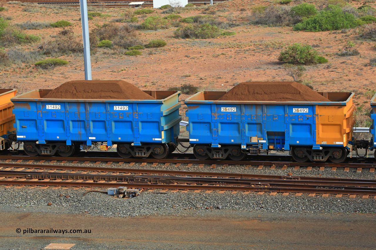 240619 0378
Cape Lambert yard, one of Rio Tinto's blue rakes with spring assisted park brake and only electronic controlled pneumatic [ECP] braking, waggon pair 31492 is a master and is bar coupled to slave waggon 36492 built by China Northen as a Q type in 12/2022. Captured on June 19, 2024.
Keywords: 31492;36492;Q-type;China-Northern;Rio-ore-waggon;
