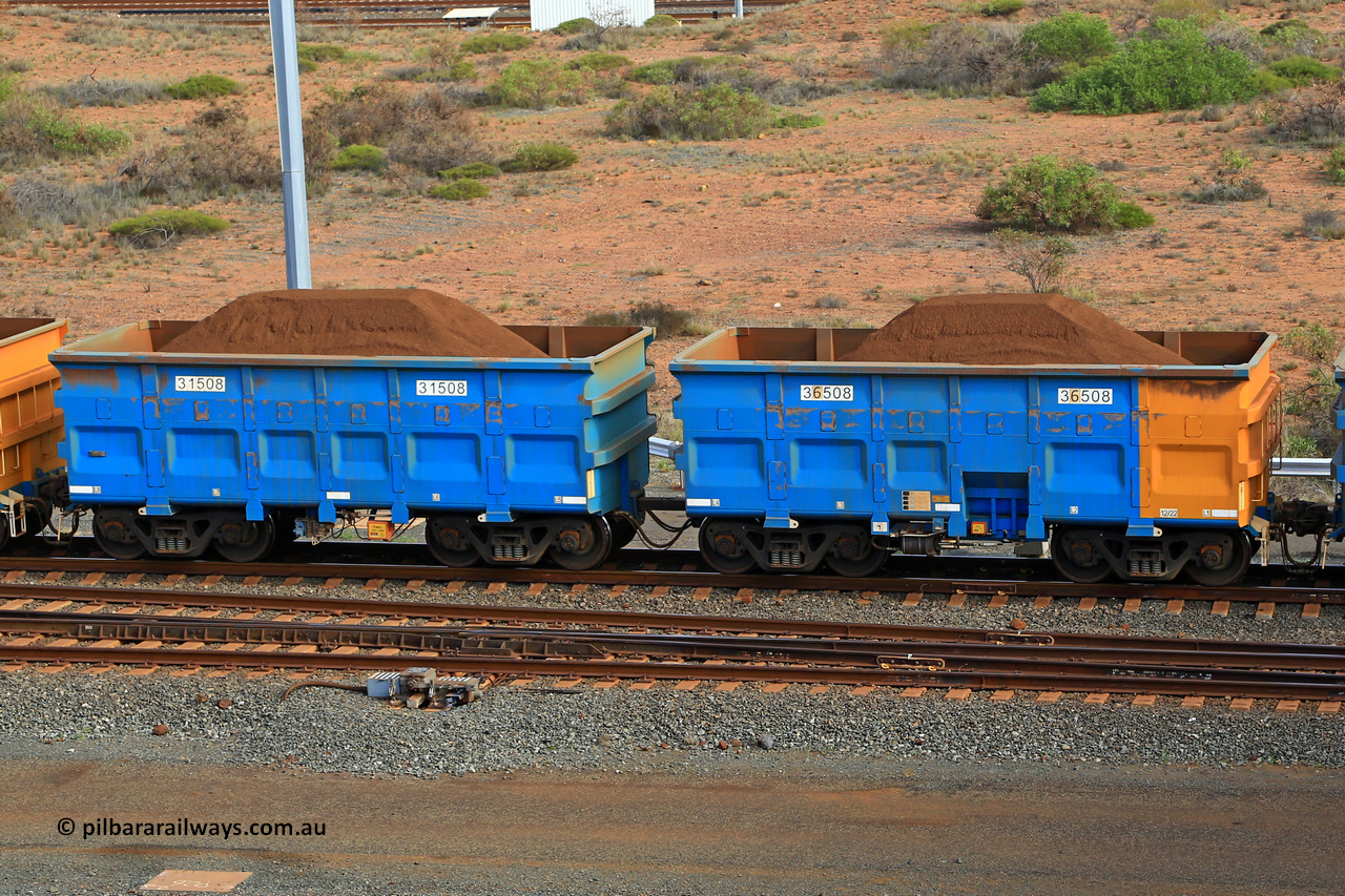 240619 0380
Cape Lambert yard, one of Rio Tinto's blue rakes with spring assisted park brake and only electronic controlled pneumatic [ECP] braking, waggon pair 31508 is a master and is bar coupled to slave waggon 36508 built by China Northen as a Q type in 12/2022. Captured on June 19, 2024.
Keywords: 31508;36508;Q-type;China-Northern;Rio-ore-waggon;