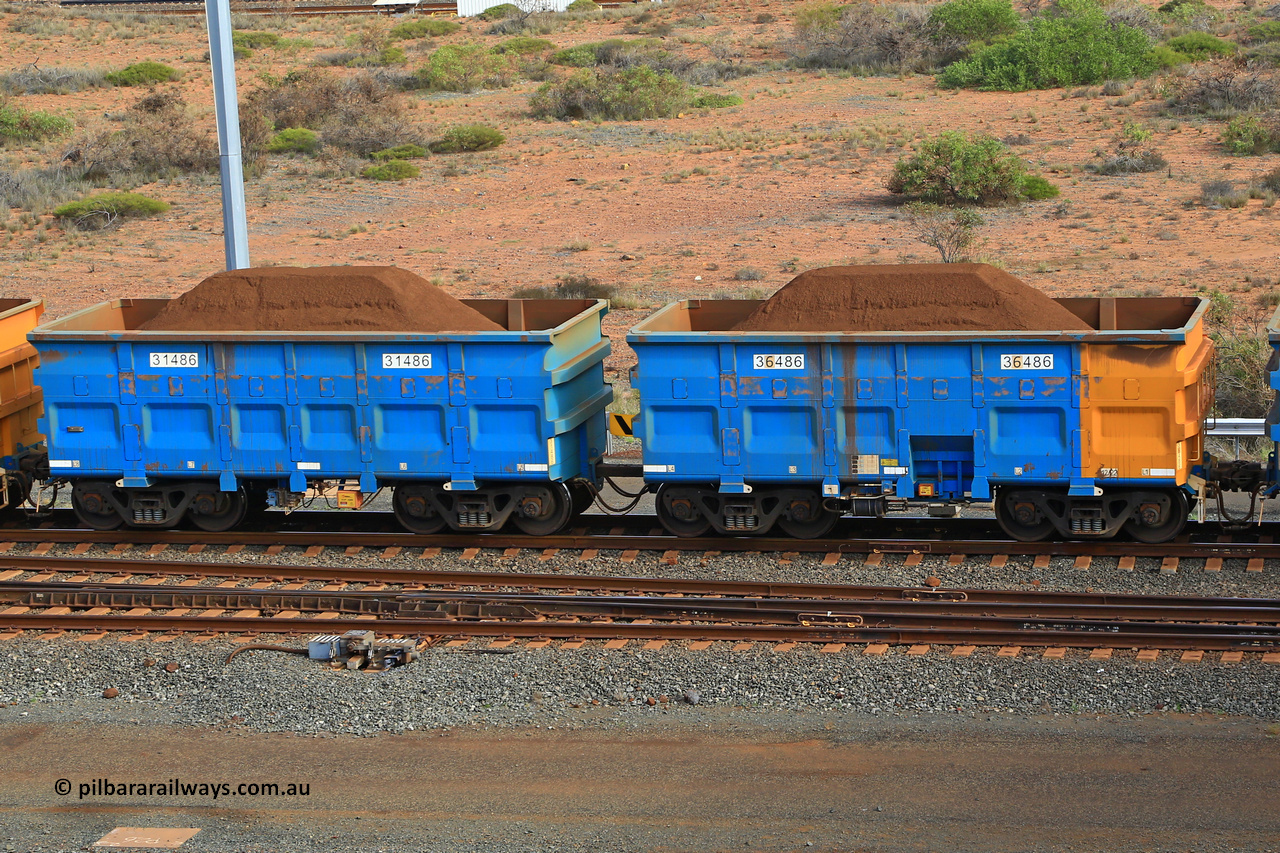 240619 0386
Cape Lambert yard, one of Rio Tinto's blue rakes with spring assisted park brake and only electronic controlled pneumatic [ECP] braking, waggon pair 31486 is a master and is bar coupled to slave waggon 36486 built by China Northen as a Q type in 12/2022. Captured on June 19, 2024.
Keywords: 31486;36486;Q-type;China-Northern;Rio-ore-waggon;