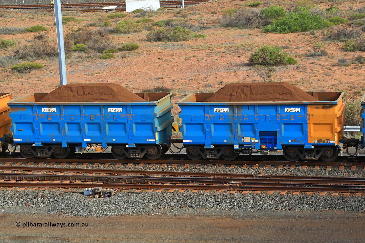 240619 0387
Cape Lambert yard, one of Rio Tinto's blue rakes with spring assisted park brake and only electronic controlled pneumatic [ECP] braking, waggon pair 31452 is a master and is bar coupled to slave waggon 36452 built by China Northen as a Q type in 12/2022. Captured on June 19, 2024.
Keywords: 31452;36452;Q-type;China-Northern;Rio-ore-waggon;