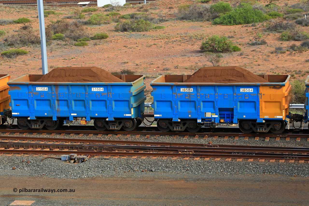 240619 0393
Cape Lambert yard, one of Rio Tinto's blue rakes with spring assisted park brake and only electronic controlled pneumatic [ECP] braking, waggon pair 31584 is a master and is bar coupled to slave waggon 36584 built by China Northen as a Q type in 12/2022. Captured on June 19, 2024.
Keywords: 31584;36584;Q-type;China-Northern;Rio-ore-waggon;
