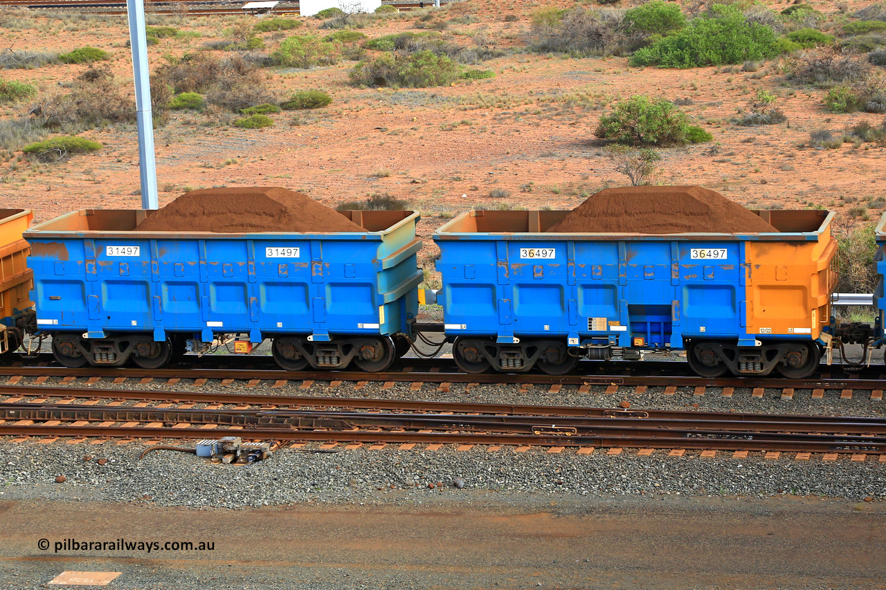 240619 0398
Cape Lambert yard, one of Rio Tinto's blue rakes with spring assisted park brake and only electronic controlled pneumatic [ECP] braking, waggon pair 31497 is a master and is bar coupled to slave waggon 36497 built by China Northen as a Q type in 12/2022. Captured on June 19, 2024.
Keywords: 31497;36497;Q-type;China-Northern;Rio-ore-waggon;