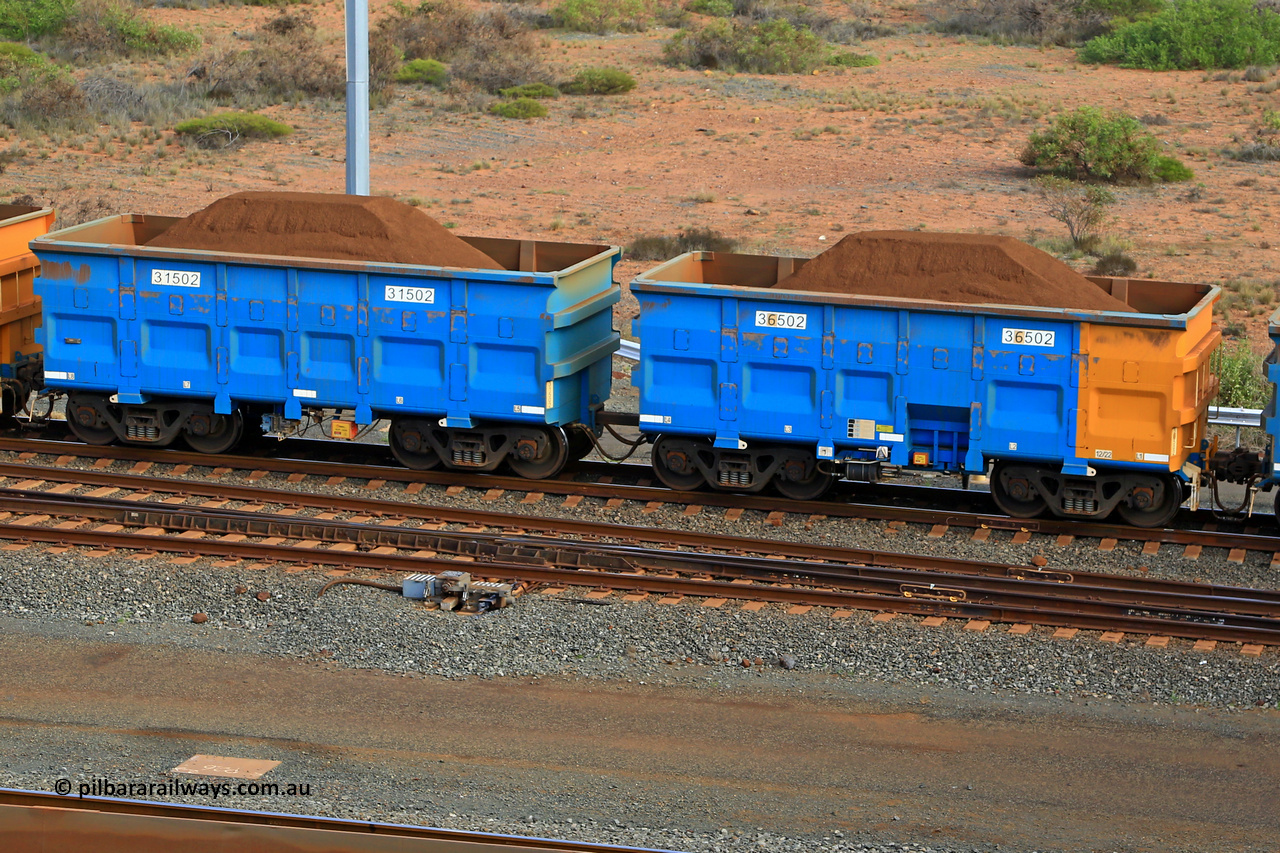 240619 0401
Cape Lambert yard, one of Rio Tinto's blue rakes with spring assisted park brake and only electronic controlled pneumatic [ECP] braking, waggon pair 31502 is a master and is bar coupled to slave waggon 36502 built by China Northen as a Q type in 12/2022. Captured on June 19, 2024.
Keywords: 31502;36502;Q-type;China-Northern;Rio-ore-waggon;