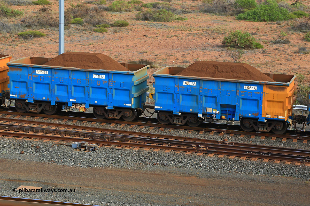 240619 0409
Cape Lambert yard, one of Rio Tinto's blue rakes with spring assisted park brake and only electronic controlled pneumatic [ECP] braking, waggon pair 31518 is a master and is bar coupled to slave waggon 36518 built by China Northen as a Q type in 12/2022. Captured on June 19, 2024.
Keywords: 31518;36518;Q-type;China-Northern;Rio-ore-waggon;