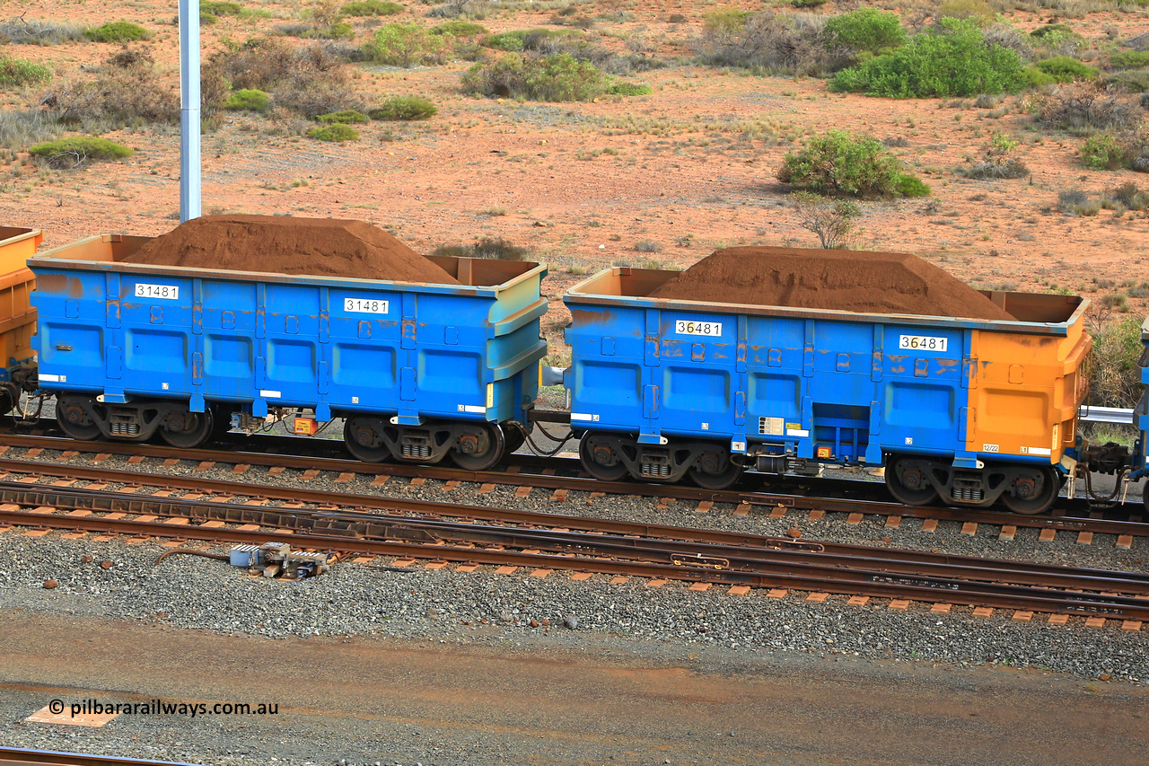 240619 0415
Cape Lambert yard, one of Rio Tinto's blue rakes with spring assisted park brake and only electronic controlled pneumatic [ECP] braking, waggon pair 31481 is a master and is bar coupled to slave waggon 36481 built by China Northen as a Q type in 12/2022. Captured on June 19, 2024.
Keywords: 31481;36481;Q-type;China-Northern;Rio-ore-waggon;