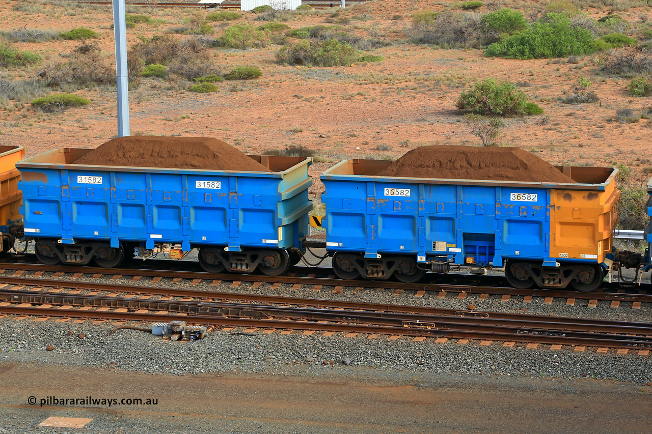 240619 0431
Cape Lambert yard, one of Rio Tinto's blue rakes with spring assisted park brake and only electronic controlled pneumatic [ECP] braking, waggon pair 31582 is a master and is bar coupled to slave waggon 36582 built by China Northen as a Q type in 12/2022. Captured on June 19, 2024.
Keywords: 31582;36582;Q-type;China-Northern;Rio-ore-waggon;