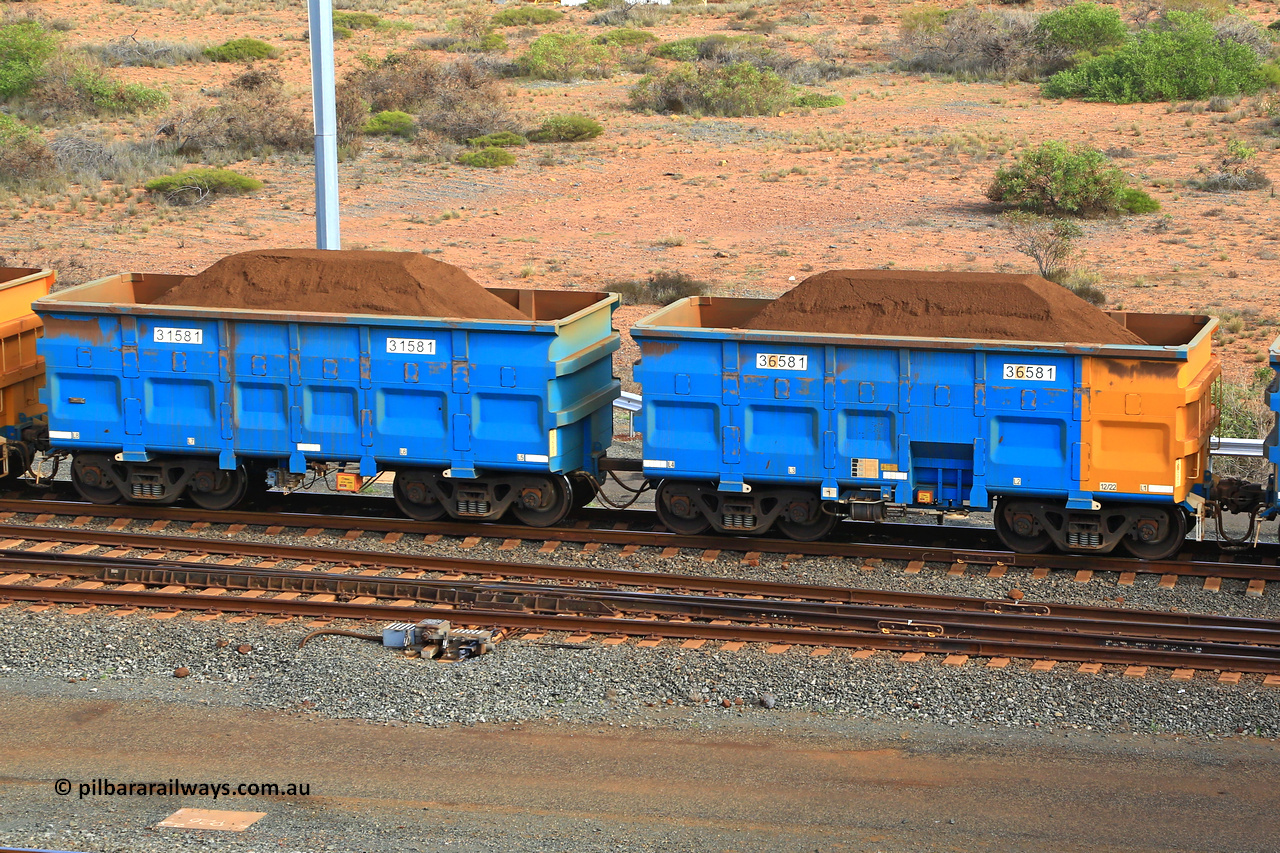 240619 0433
Cape Lambert yard, one of Rio Tinto's blue rakes with spring assisted park brake and only electronic controlled pneumatic [ECP] braking, waggon pair 31581 is a master and is bar coupled to slave waggon 36581 built by China Northen as a Q type in 12/2022. Captured on June 19, 2024.
Keywords: 31581;36581;Q-type;China-Northern;Rio-ore-waggon;