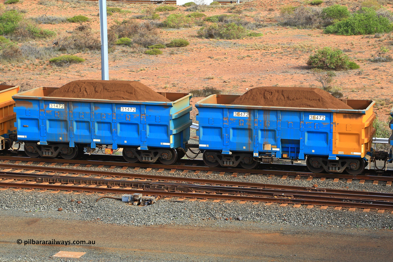 240619 0436
Cape Lambert yard, one of Rio Tinto's blue rakes with spring assisted park brake and only electronic controlled pneumatic [ECP] braking, waggon pair 31472 is a master and is bar coupled to slave waggon 36472 built by China Northen as a Q type in 12/2022. Captured on June 19, 2024.
Keywords: 31472;36472;Q-type;China-Northern;Rio-ore-waggon;