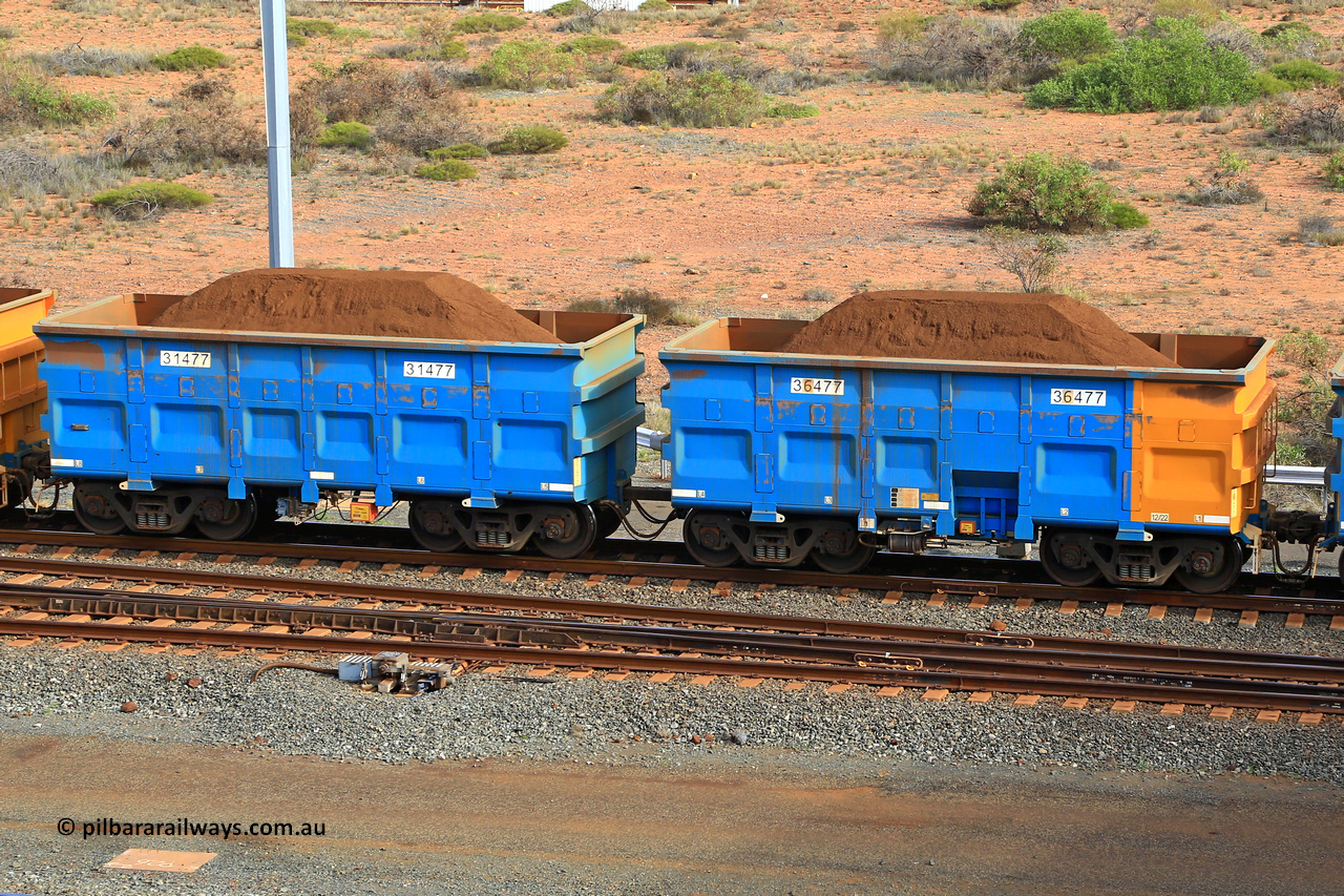 240619 0437
Cape Lambert yard, one of Rio Tinto's blue rakes with spring assisted park brake and only electronic controlled pneumatic [ECP] braking, waggon pair 31477 is a master and is bar coupled to slave waggon 36477 built by China Northen as a Q type in 12/2022. Captured on June 19, 2024.
Keywords: 31477;36477;Q-type;China-Northern;Rio-ore-waggon;