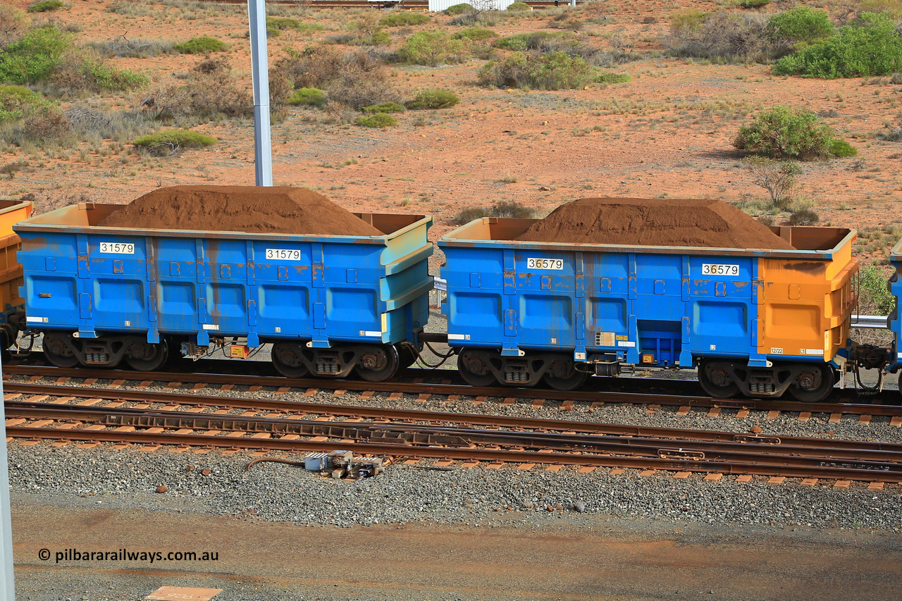 240619 0439
Cape Lambert yard, one of Rio Tinto's blue rakes with spring assisted park brake and only electronic controlled pneumatic [ECP] braking, waggon pair 31579 is a master and is bar coupled to slave waggon 36579 built by China Northen as a Q type in 12/2022. Captured on June 19, 2024.
Keywords: 31579;36579;Q-type;China-Northern;Rio-ore-waggon;