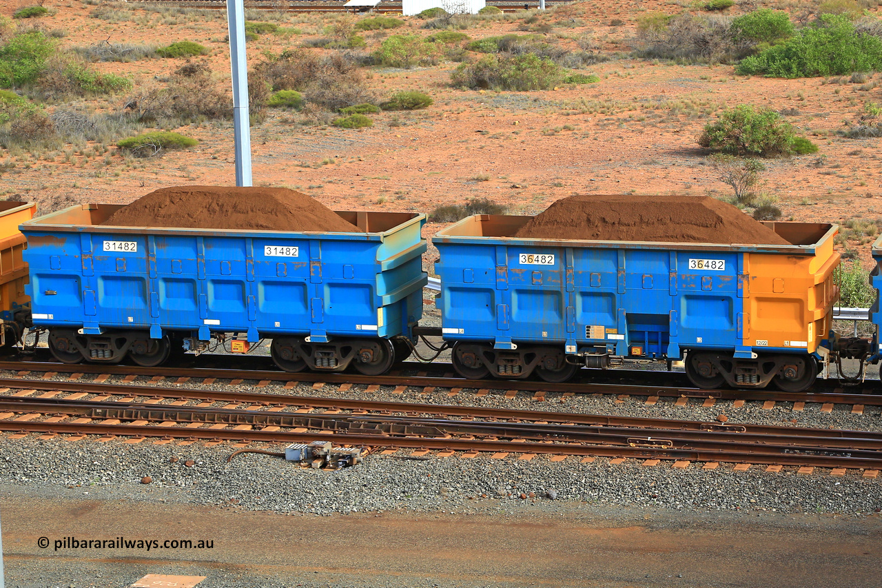 240619 0441
Cape Lambert yard, one of Rio Tinto's blue rakes with spring assisted park brake and only electronic controlled pneumatic [ECP] braking, waggon pair 31482 is a master and is bar coupled to slave waggon 36482 built by China Northen as a Q type in 12/2022. Captured on June 19, 2024.
Keywords: 31482;36482;Q-type;China-Northern;Rio-ore-waggon;