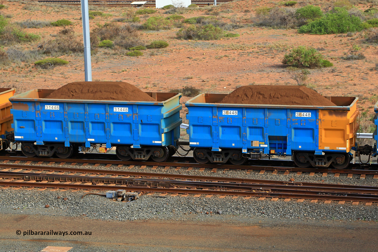 240619 0446
Cape Lambert yard, one of Rio Tinto's blue rakes with spring assisted park brake and only electronic controlled pneumatic [ECP] braking, waggon pair 31448 is a master and is bar coupled to slave waggon 36448 built by China Northen as a Q type in 12/2022. Captured on June 19, 2024.
Keywords: 31448;36448;Q-type;China-Northern;Rio-ore-waggon;