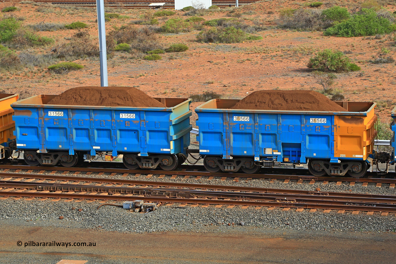240619 0451
Cape Lambert yard, one of Rio Tinto's blue rakes with spring assisted park brake and only electronic controlled pneumatic [ECP] braking, waggon pair 31566 is a master and is bar coupled to slave waggon 36566 built by China Northen as a Q type in 12/2022. Captured on June 19, 2024.
Keywords: 31566;36566;Q-type;China-Northern;Rio-ore-waggon;