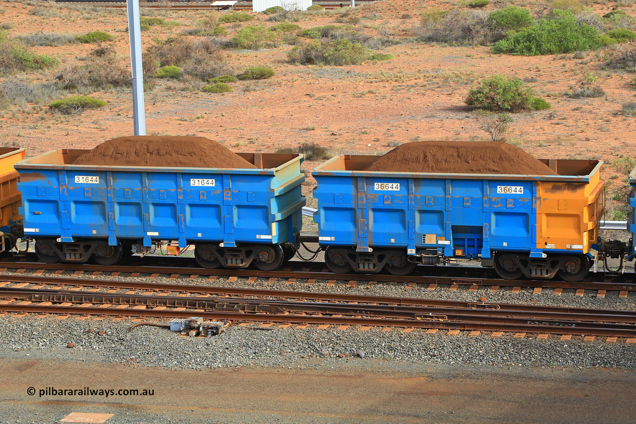 240619 0453
Cape Lambert yard, one of Rio Tinto's blue rakes with spring assisted park brake and only electronic controlled pneumatic [ECP] braking, waggon pair 31644 is a master and is bar coupled to slave waggon 36644 built by China Northen as a Q type in 11/2022. Captured on June 19, 2024.
Keywords: 31644;36644;Q-type;China-Northern;Rio-ore-waggon;