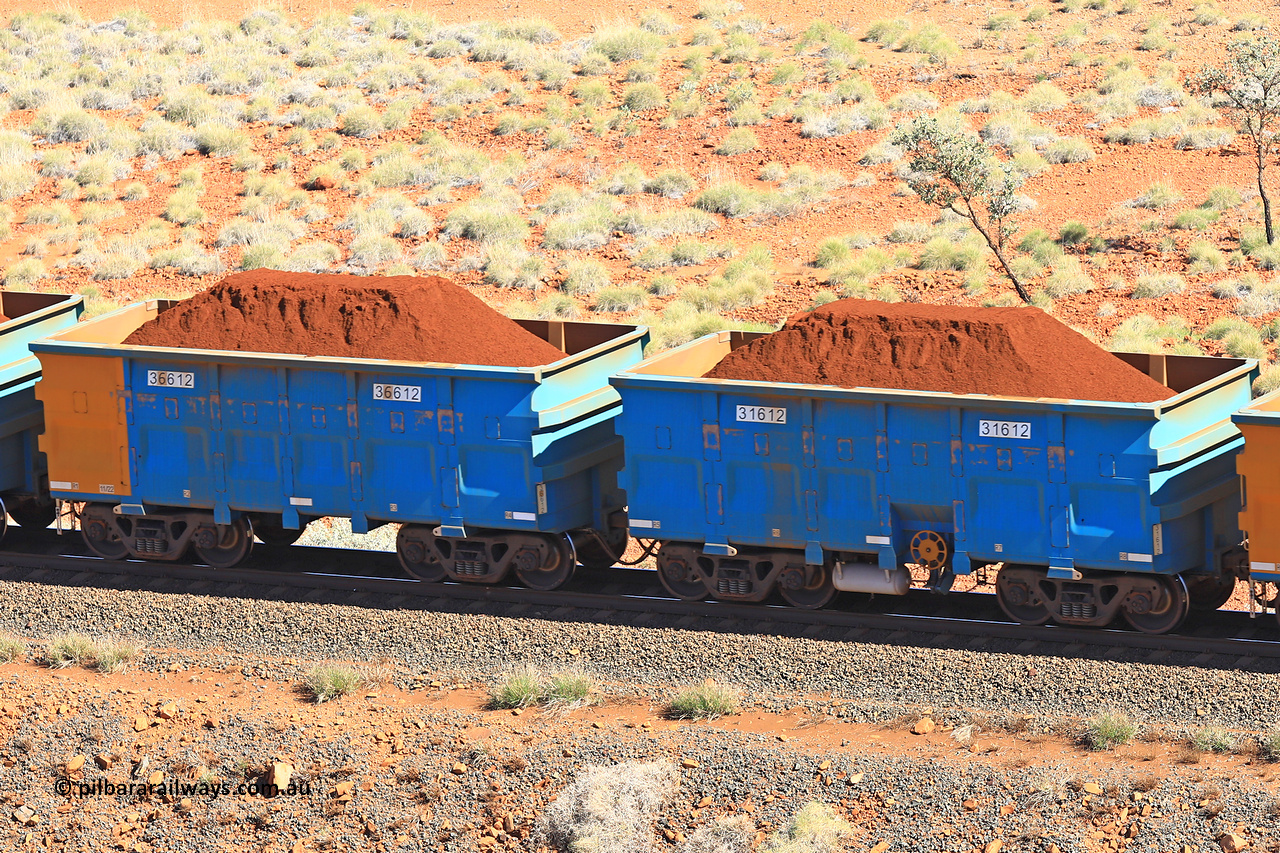 240701 2402
Western Creek, 67 km, one of Rio Tinto's blue rakes with spring assisted park brake and only electronic controlled pneumatic [ECP] braking, waggon pair 31612 is a master and is bar coupled to slave waggon 36612 built by China Northen as a Q type in 11/2022. Captured on July 1, 2024.
Keywords: 31612;36612;Q-type;China-Northern;Rio-ore-waggon;