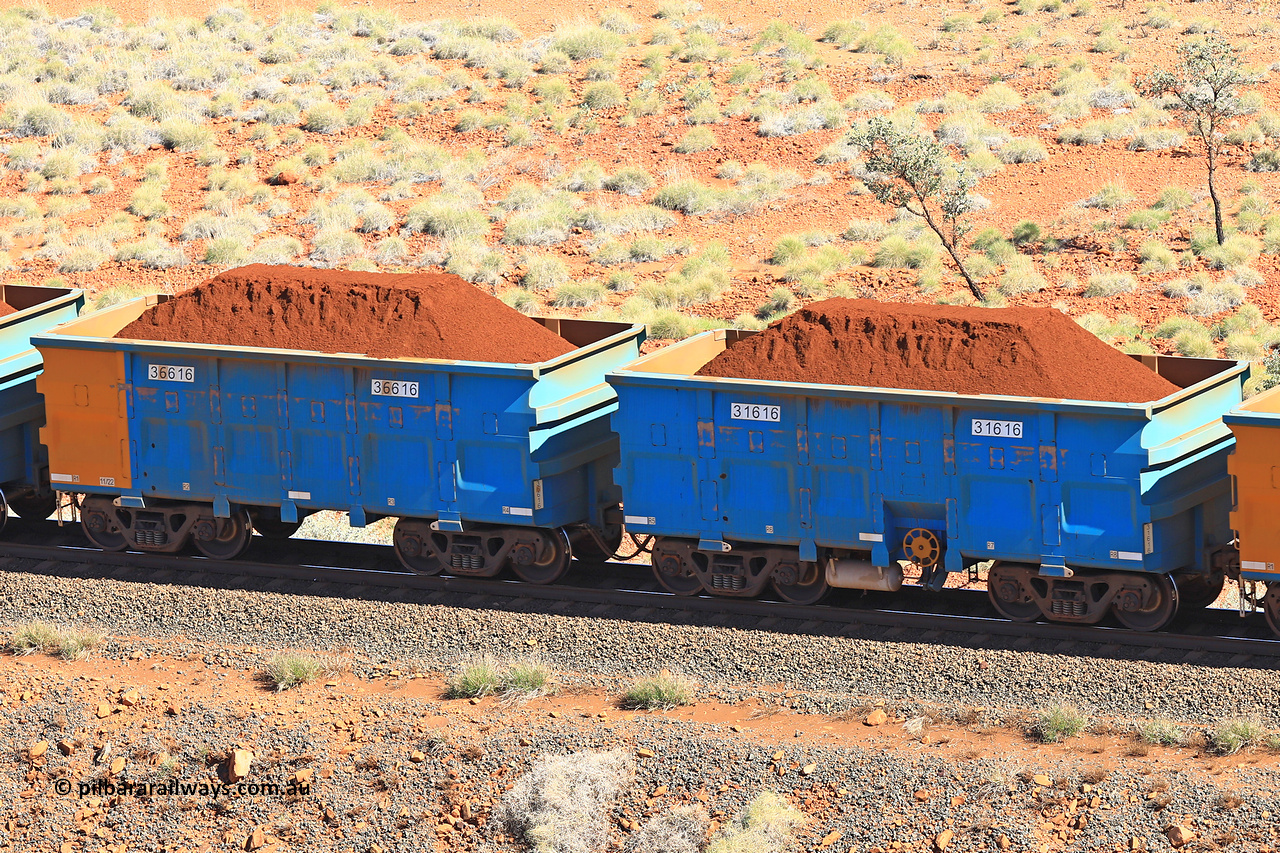 240701 2408
Western Creek, 67 km, one of Rio Tinto's blue rakes with spring assisted park brake and only electronic controlled pneumatic [ECP] braking, waggon pair 31616 is a master and is bar coupled to slave waggon 36616 built by China Northen as a Q type in 11/2022. Captured on July 1, 2024.
Keywords: 31616;36616;Q-type;China-Northern;Rio-ore-waggon;