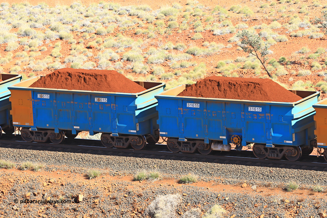 240701 2418
Western Creek, 67 km, one of Rio Tinto's blue rakes with spring assisted park brake and only electronic controlled pneumatic [ECP] braking, waggon pair 31615 is a master and is bar coupled to slave waggon 36615 built by China Northen as a Q type in 11/2022. Captured on July 1, 2024.
Keywords: 31615;36615;Q-type;China-Northern;Rio-ore-waggon;