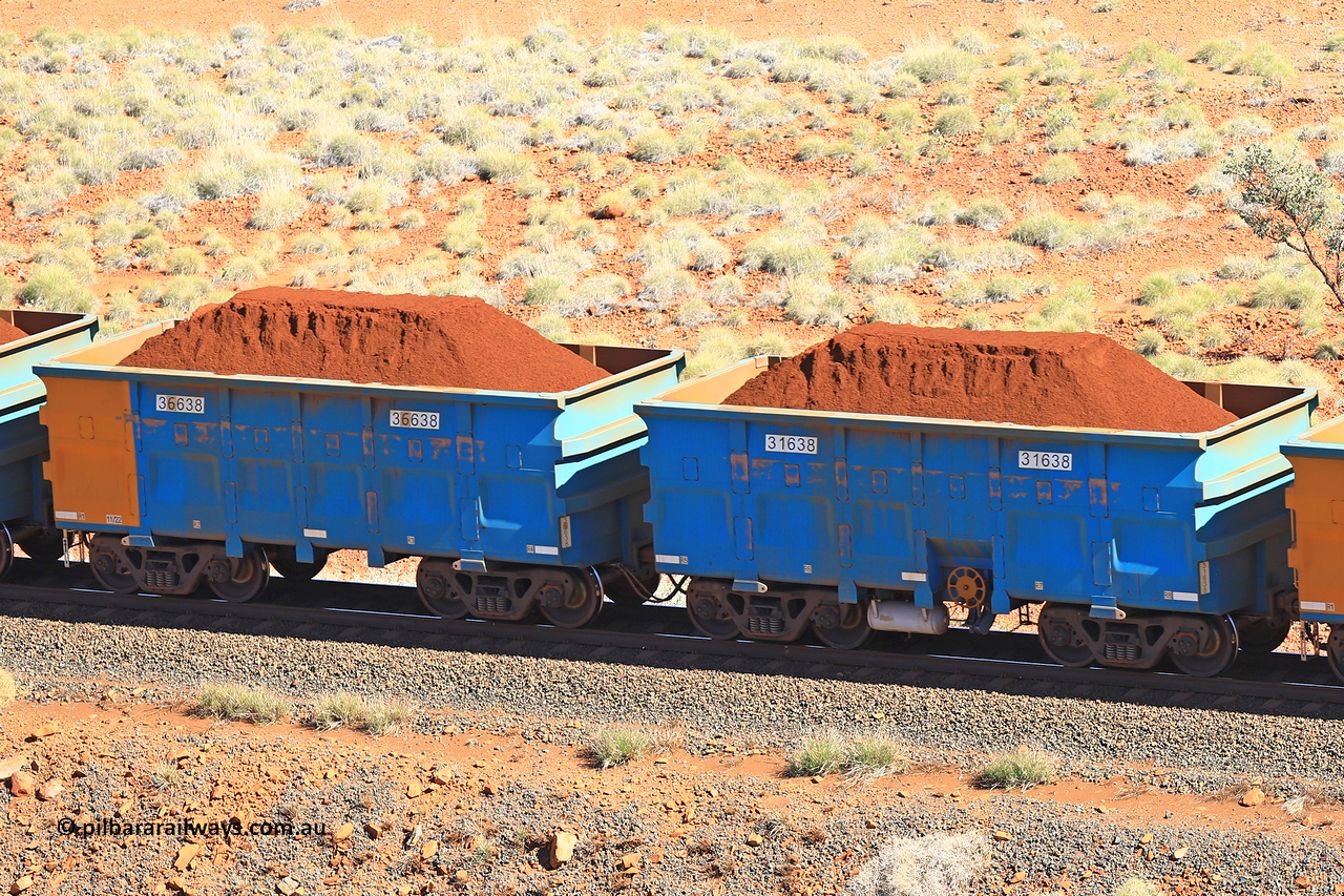 240701 2422
Western Creek, 67 km, one of Rio Tinto's blue rakes with spring assisted park brake and only electronic controlled pneumatic [ECP] braking, waggon pair 31638 is a master and is bar coupled to slave waggon 36638 built by China Northen as a Q type in 11/2022. Captured on July 1, 2024.
Keywords: 31638;36638;Q-type;China-Northern;Rio-ore-waggon;