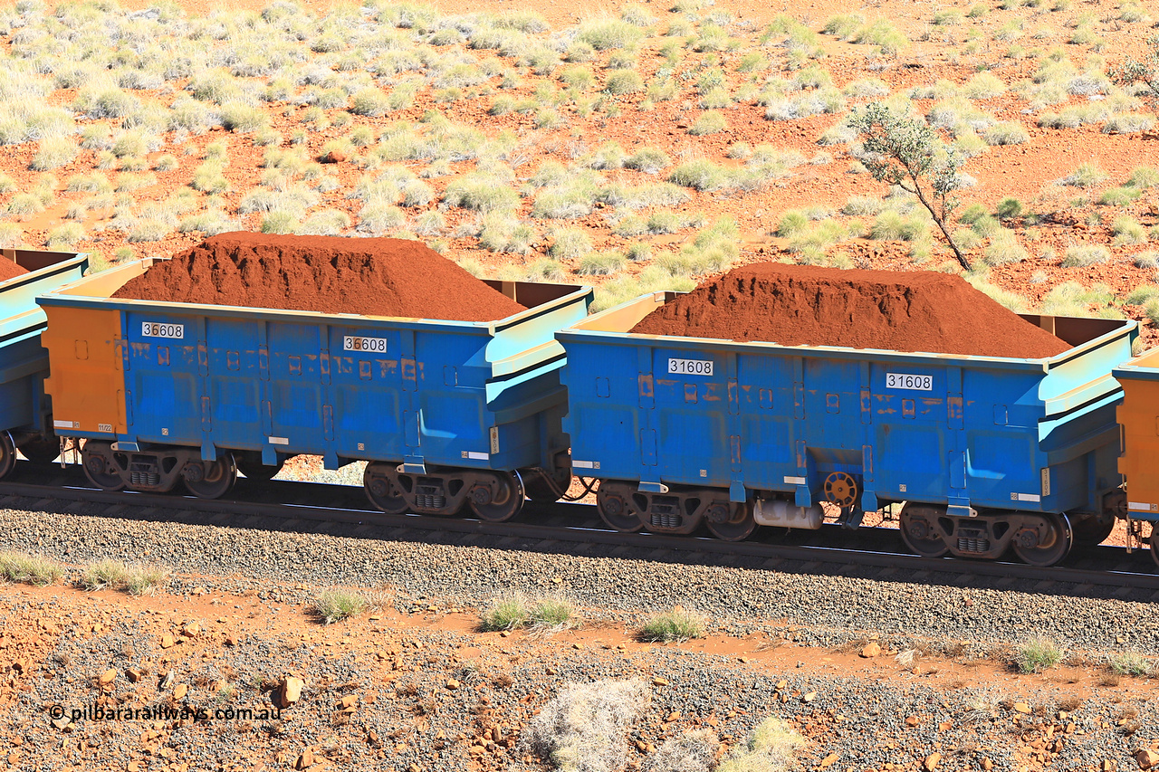 240701 2426
Western Creek, 67 km, one of Rio Tinto's blue rakes with spring assisted park brake and only electronic controlled pneumatic [ECP] braking, waggon pair 31608 is a master and is bar coupled to slave waggon 36608 built by China Northen as a Q type in 11/2022. Captured on July 1, 2024.
Keywords: 31608;36608;Q-type;China-Northern;Rio-ore-waggon;